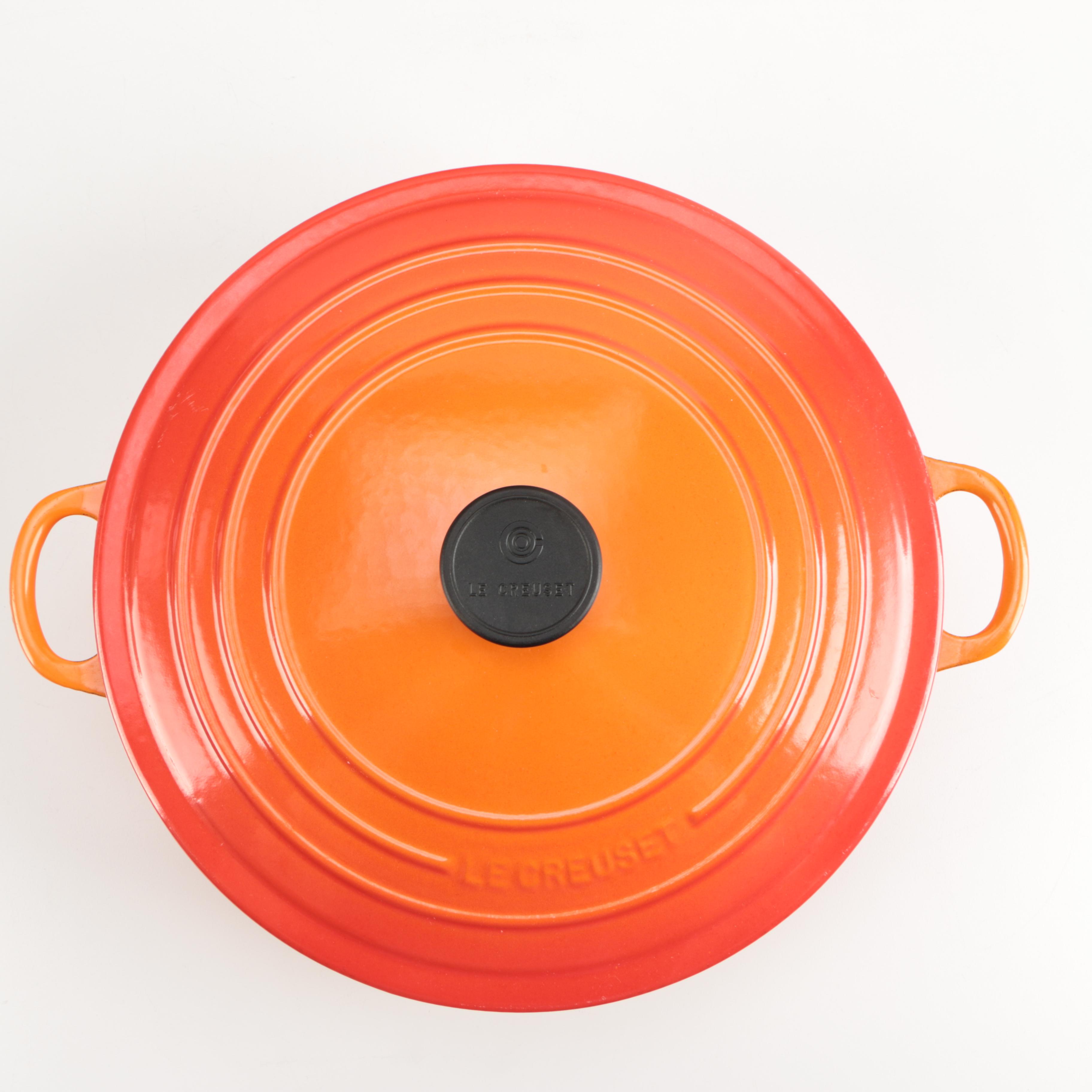 Pair of Le Creuset Orange Enamel Dutch Ovens EBTH