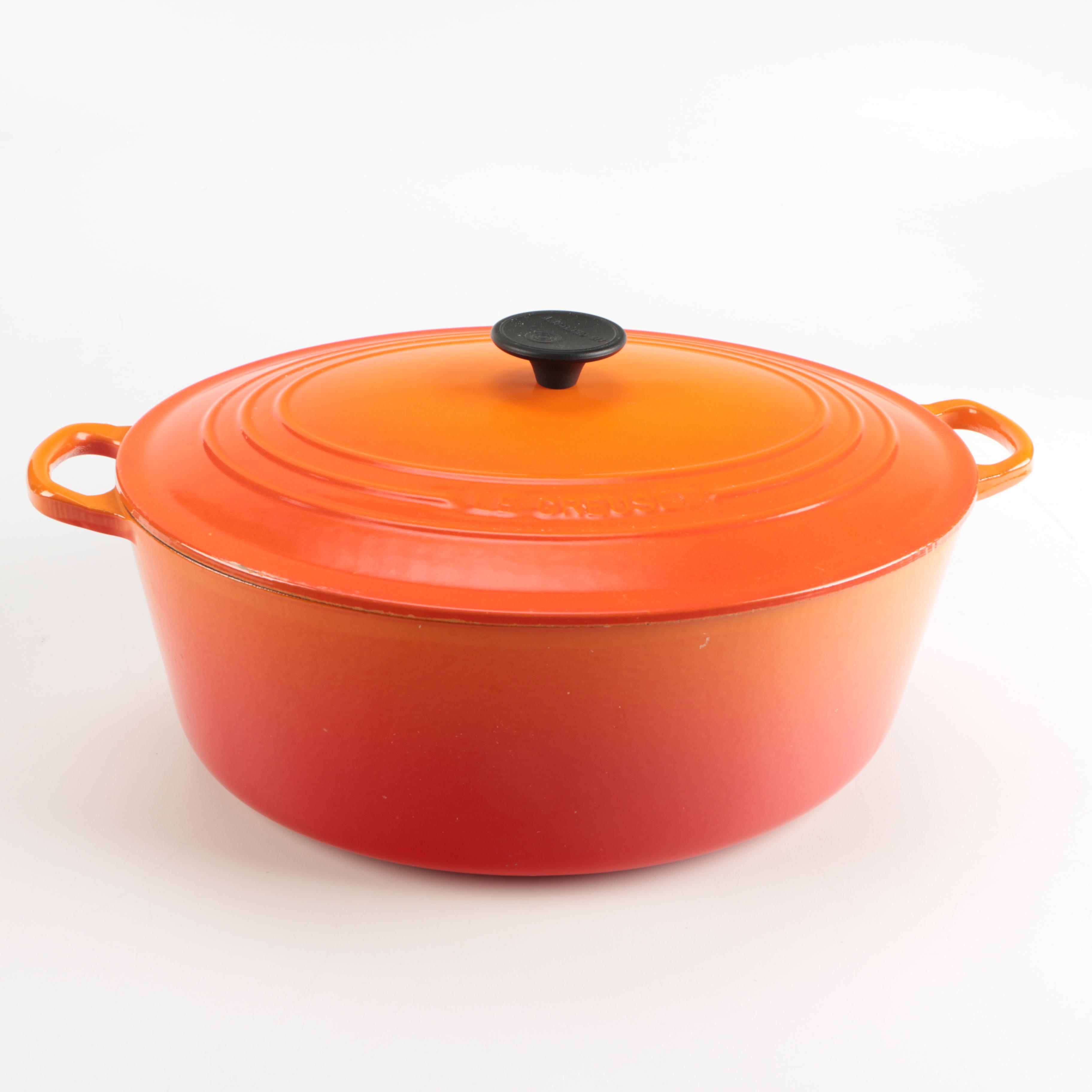 Pair of Le Creuset Orange Enamel Dutch Ovens EBTH