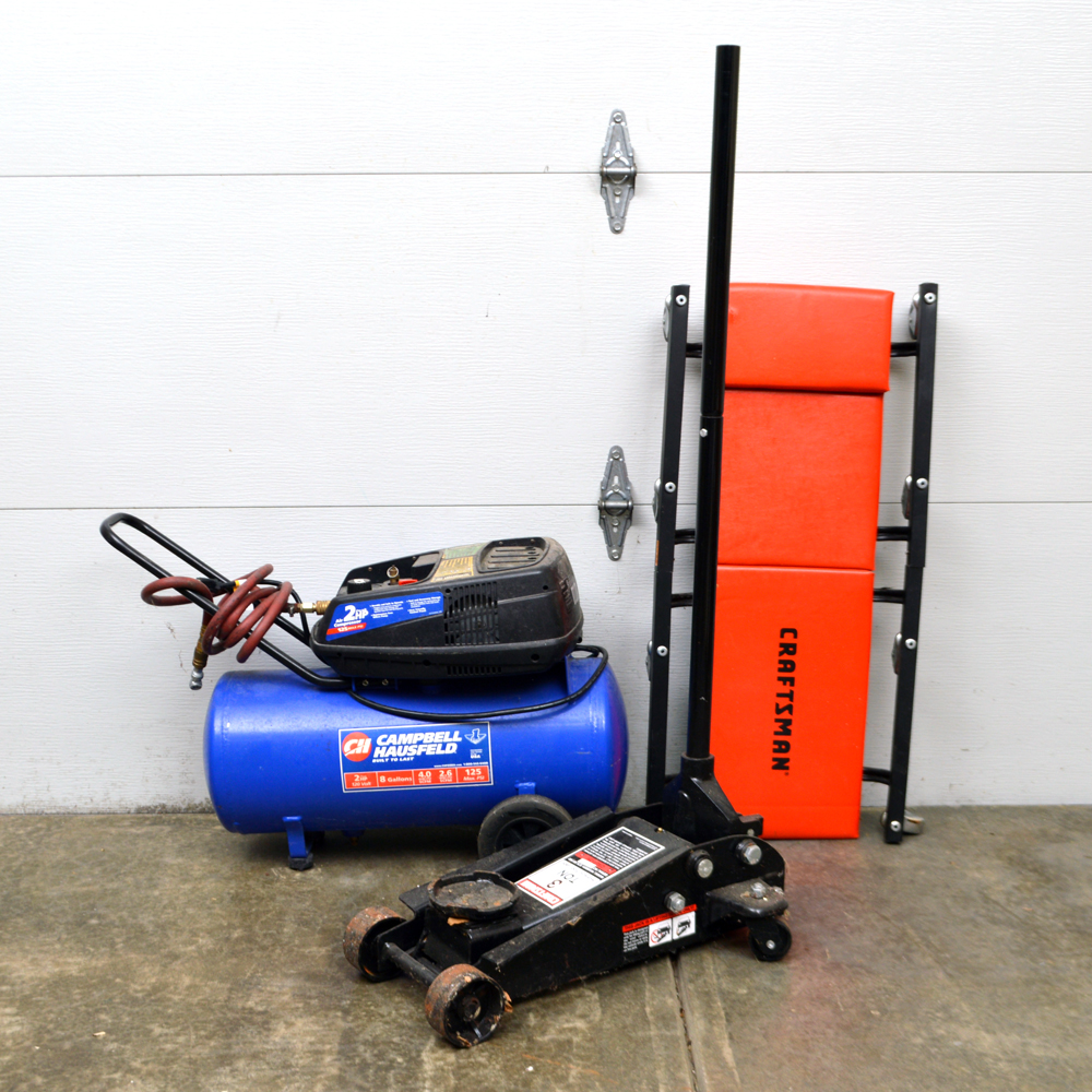 Craftsman Rolling Creeper With an Air Compressor and a Craftsman