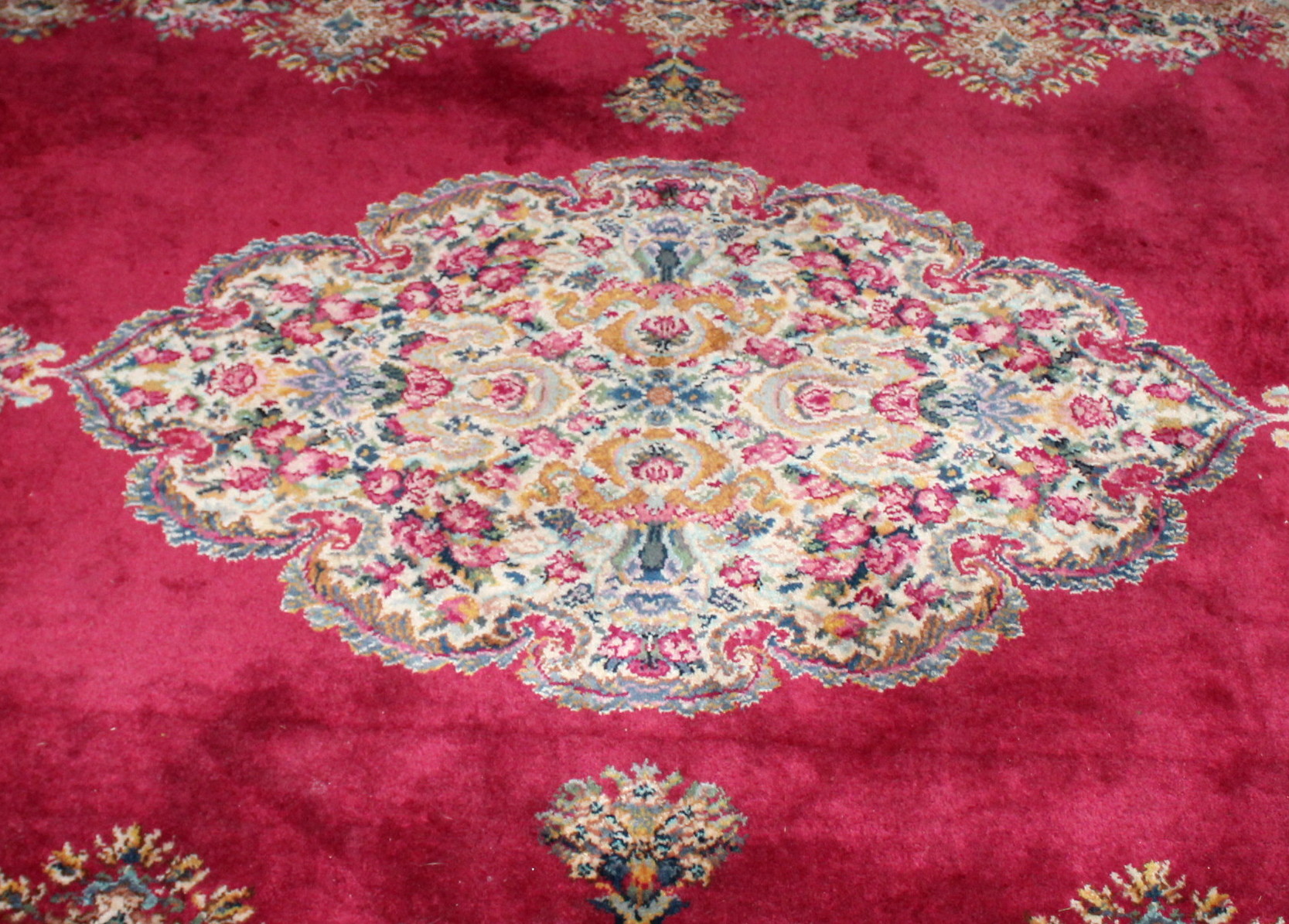 Matching Karastan "Kirman" Rugs in Three Sizes EBTH