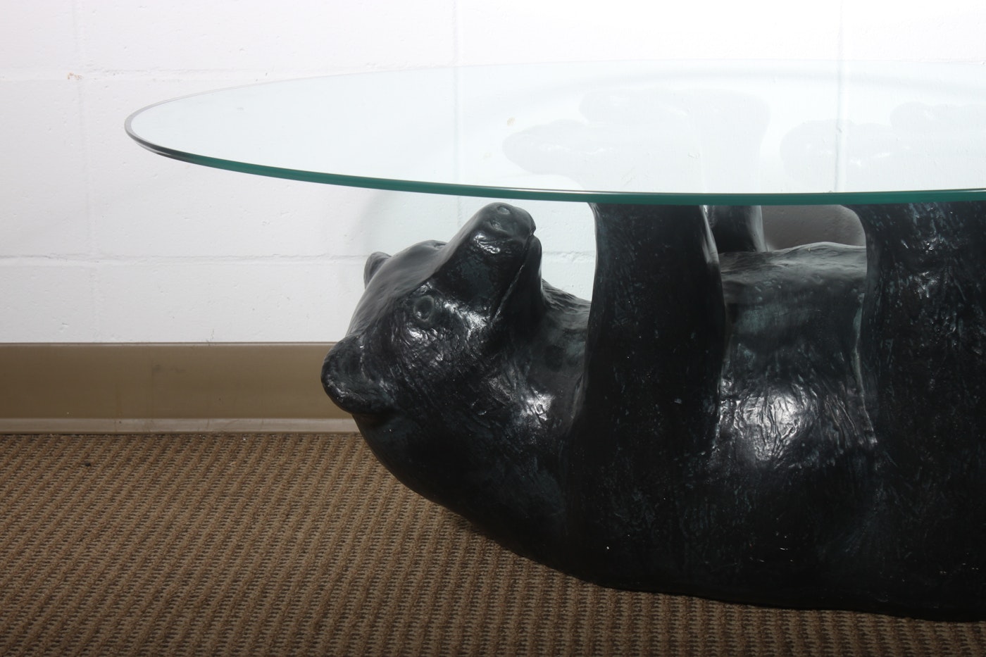 Glass Top Coffee Table With Black Bear Base | EBTH
