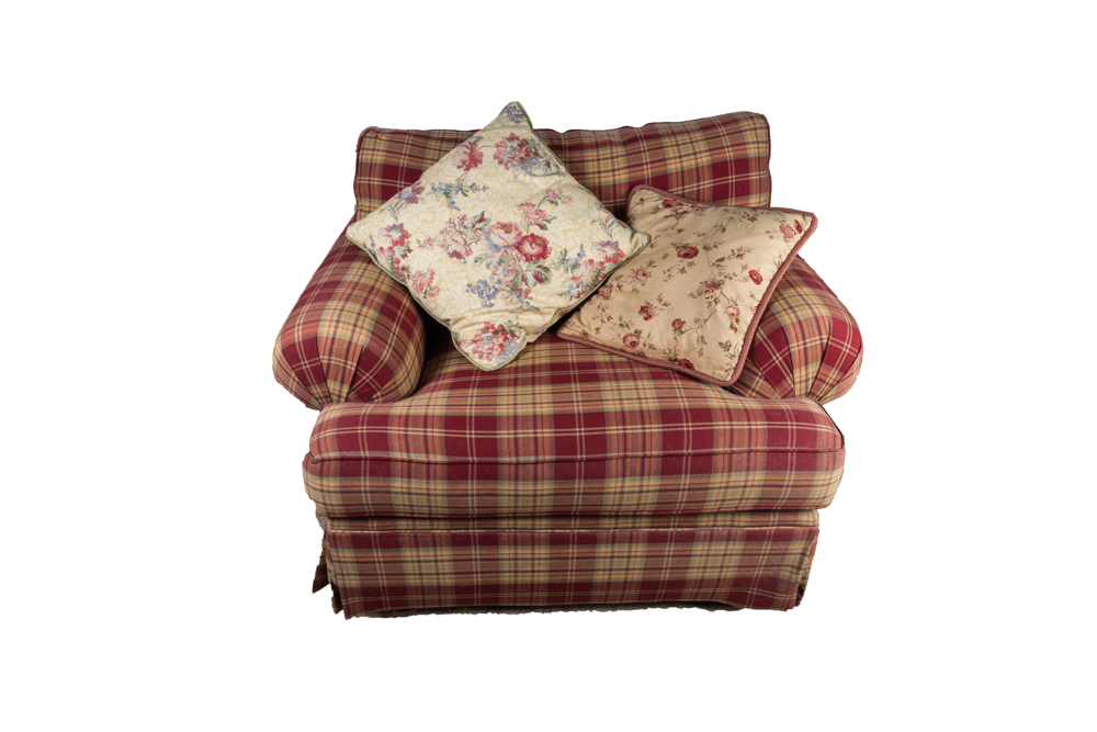 red plaid chair and ottoman