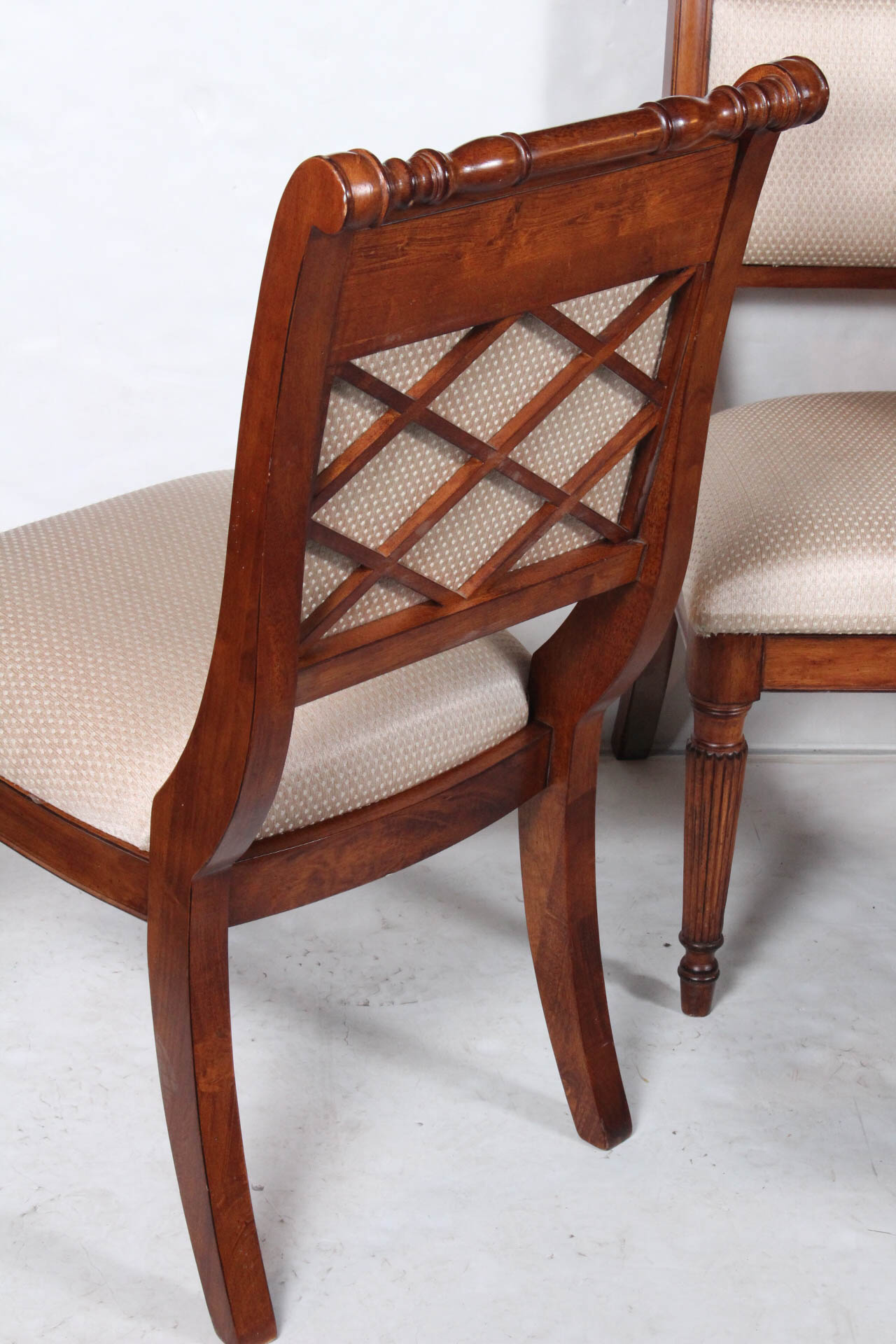 Four Traditional Cherry Dining Chairs by Ashley Furniture | EBTH