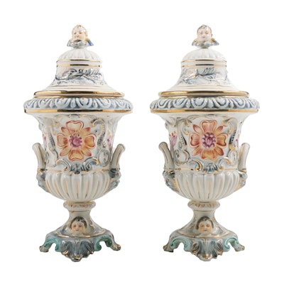 Capodimonte Porcelain Lidded Urns with Figural Handles Capodimonte Porcelain Lidded Urns with Figural Handles