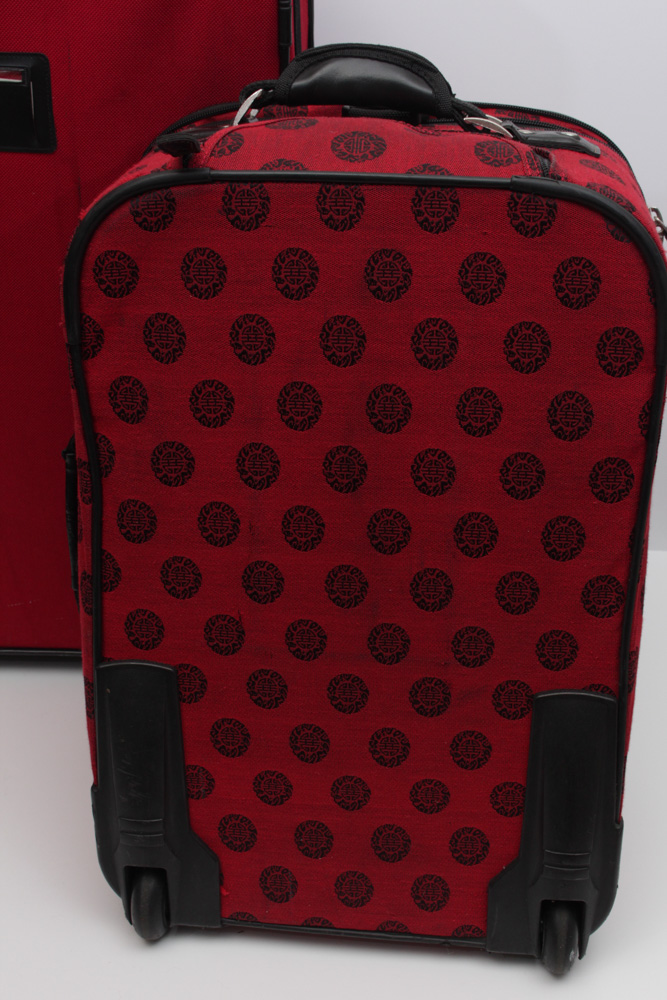 Pair of Expandable Rolling Suitcases Including Ricardo of Beverly Hills