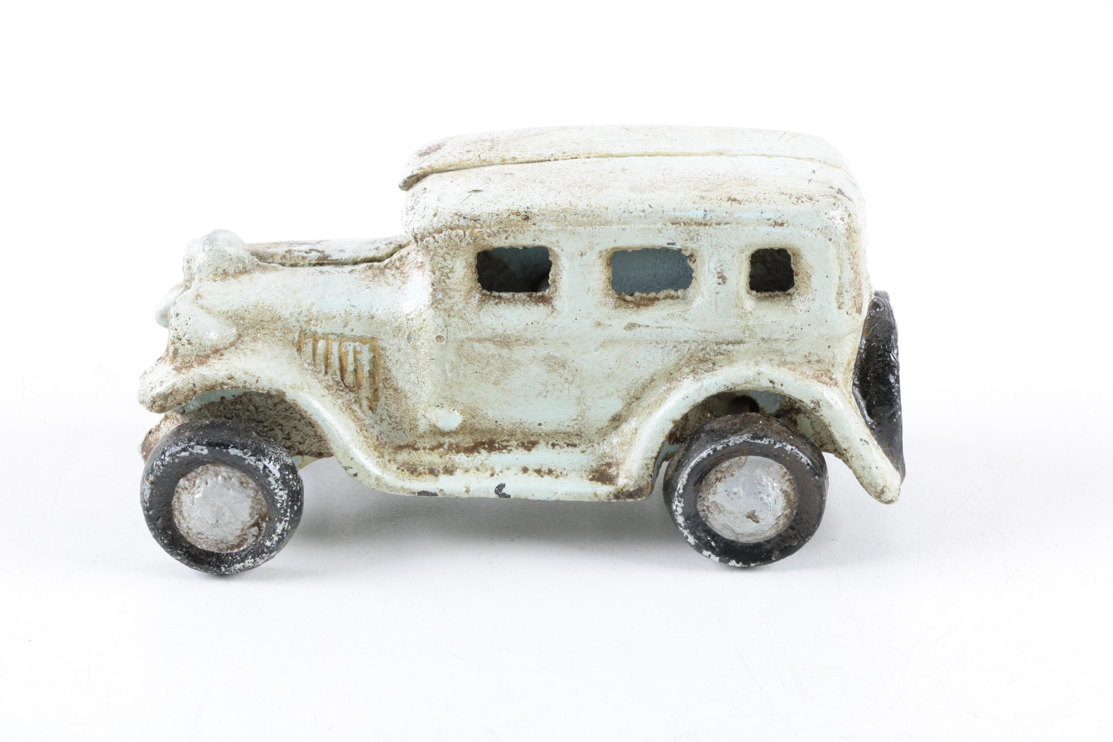 Cast Iron Toy Vehicles and Canon EBTH
