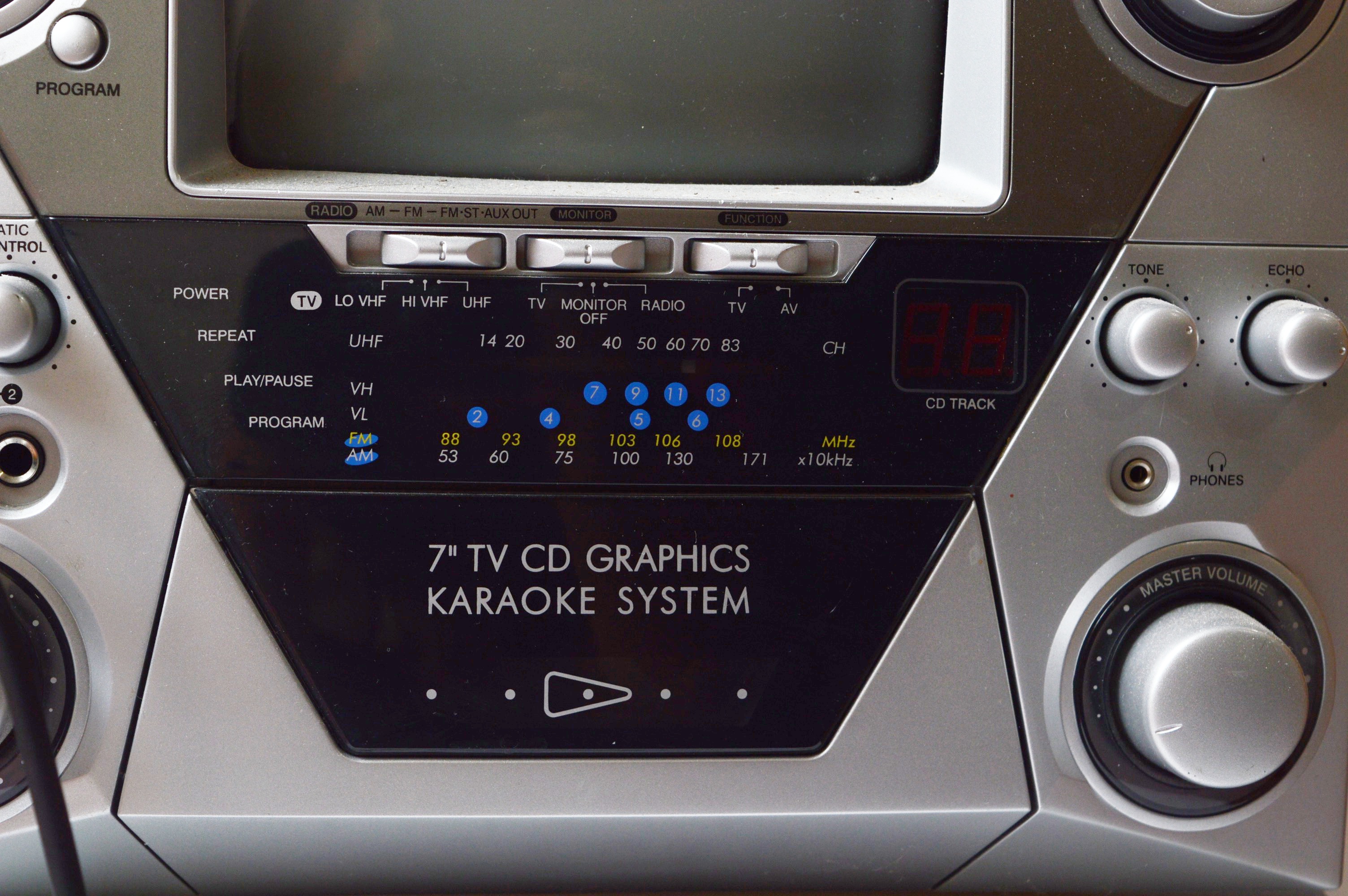 Memorex Karaoke Machine with CDs, and Hitachi Boombox EBTH