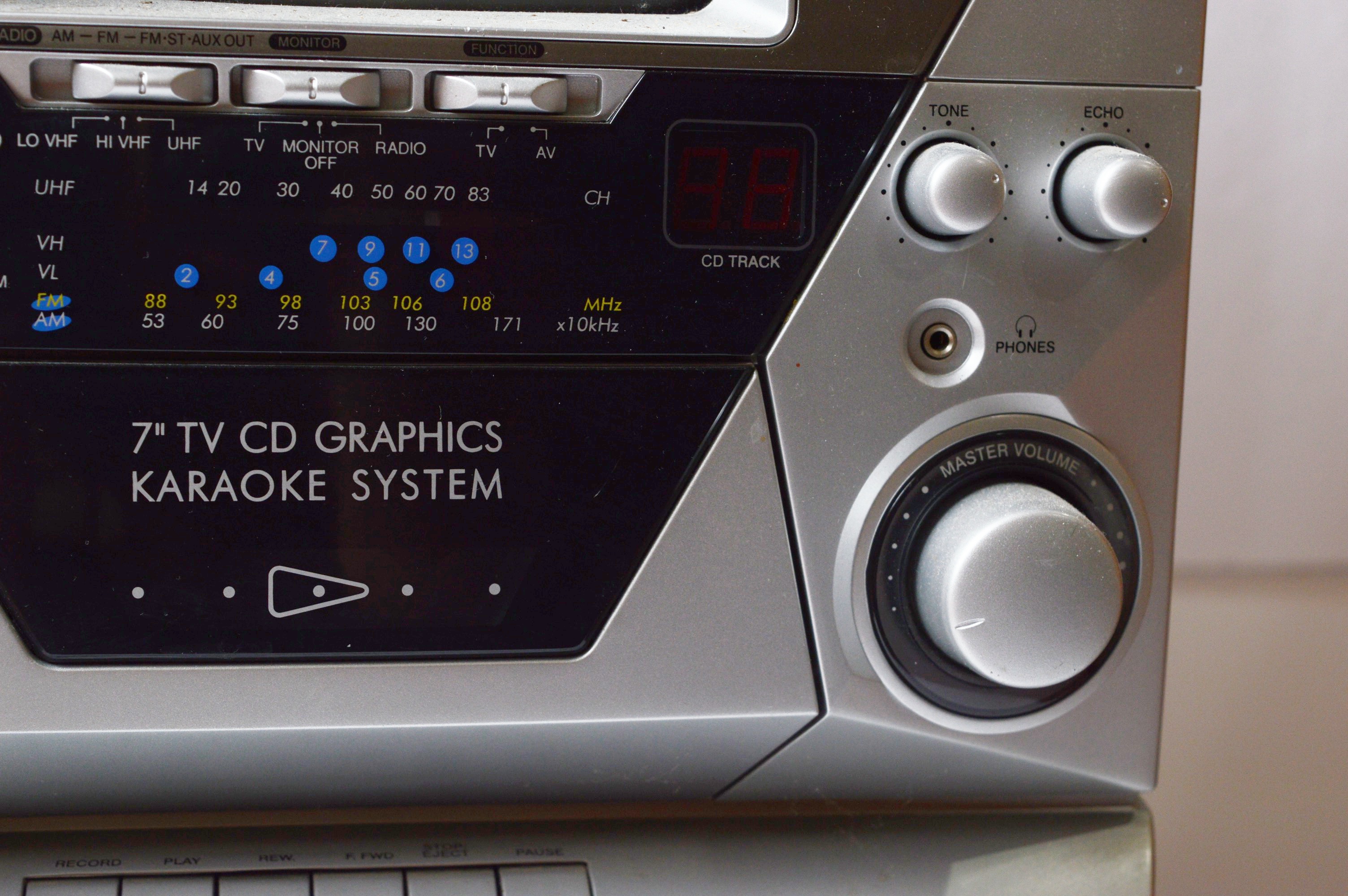 Memorex Karaoke Machine with CDs, and Hitachi Boombox EBTH