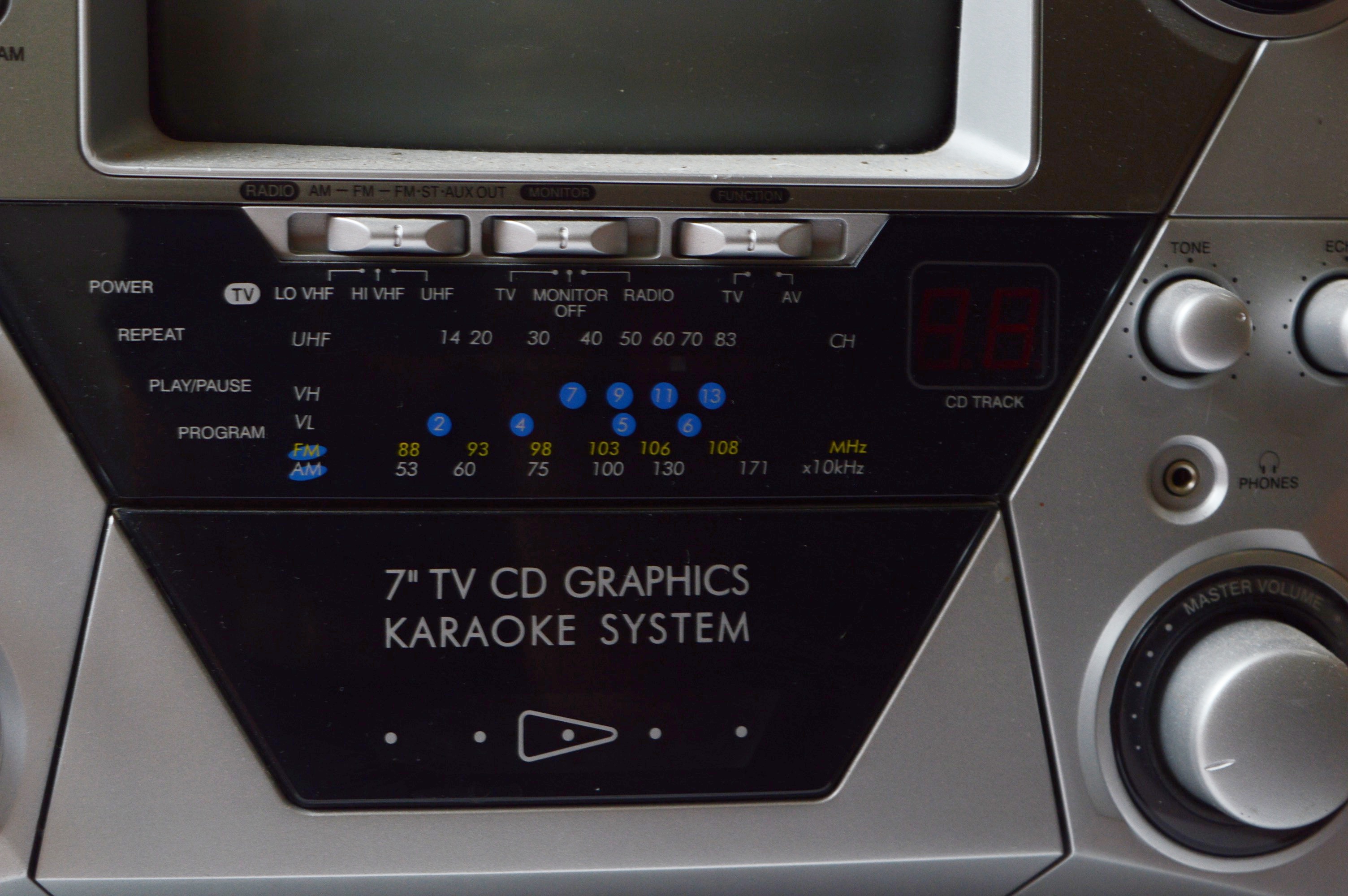 Memorex Karaoke Machine with CDs, and Hitachi Boombox EBTH