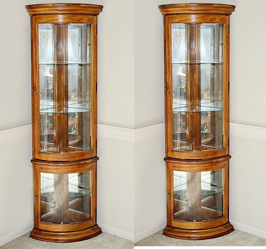 Pair of Lighted Curved Glass Corner Display Cabinets