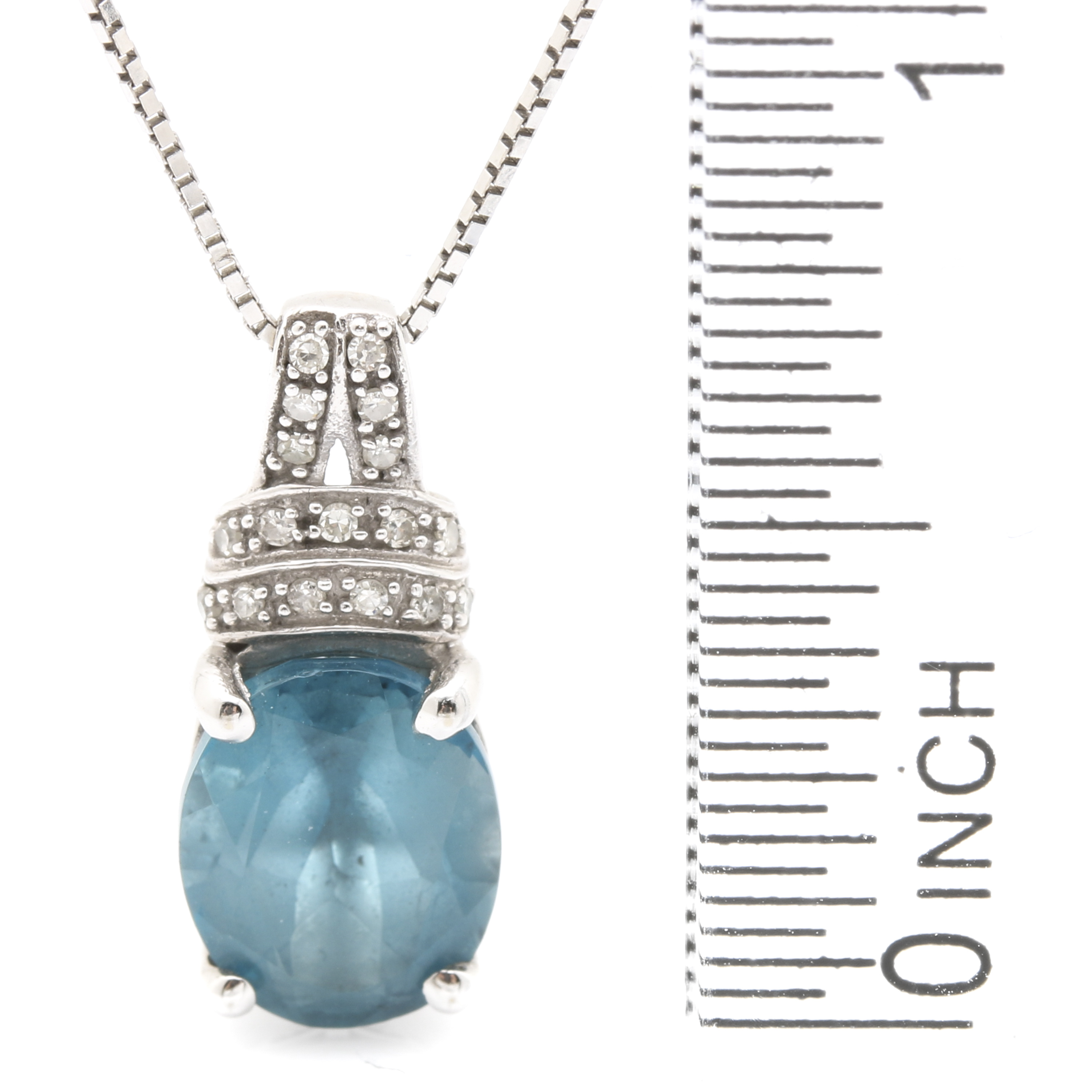 10K White Gold Blue Topaz Pendant Necklace | EBTH