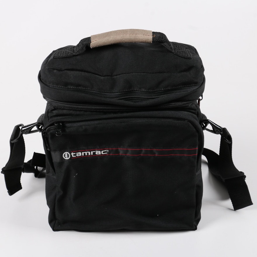 Tamrac camera bag with camera lens and accessories | EBTH