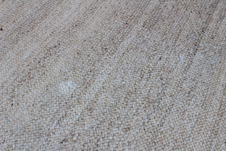 Woven Jute Rug In Dining Room