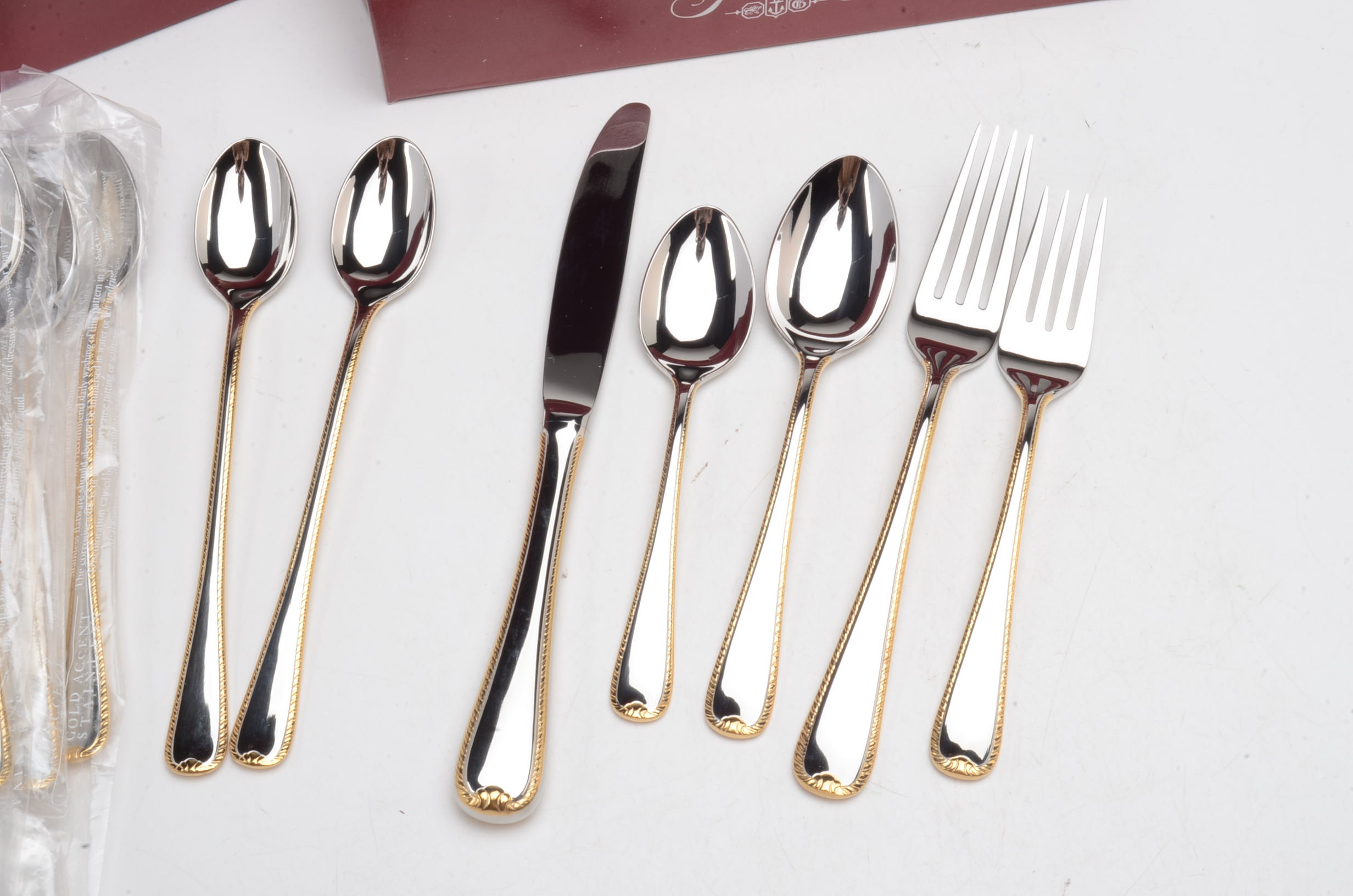 Contemporary Gorham Stainless Flatware with Gold Accent Edge EBTH