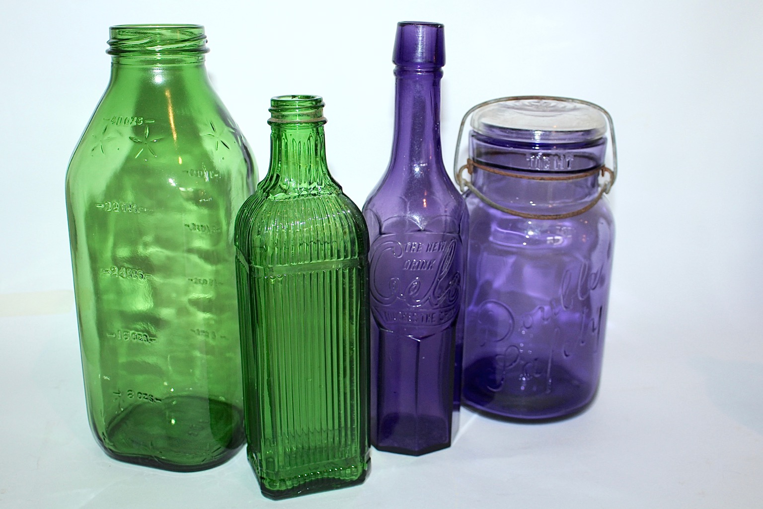 Color Glass Bottle Collection with Decorative China Plates EBTH
