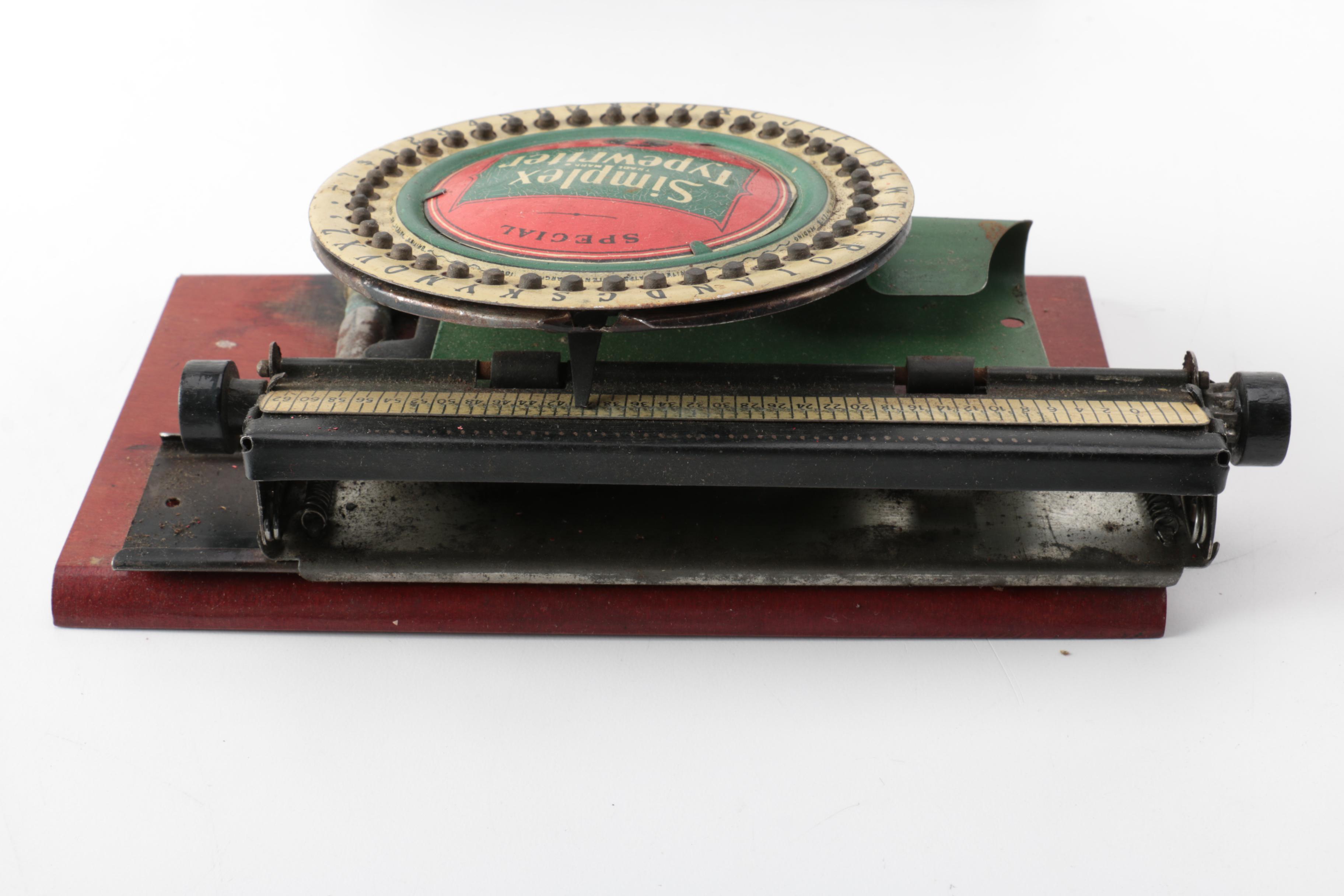 Vintage Simplex Typewriter and Ink Ribbons in Tins EBTH