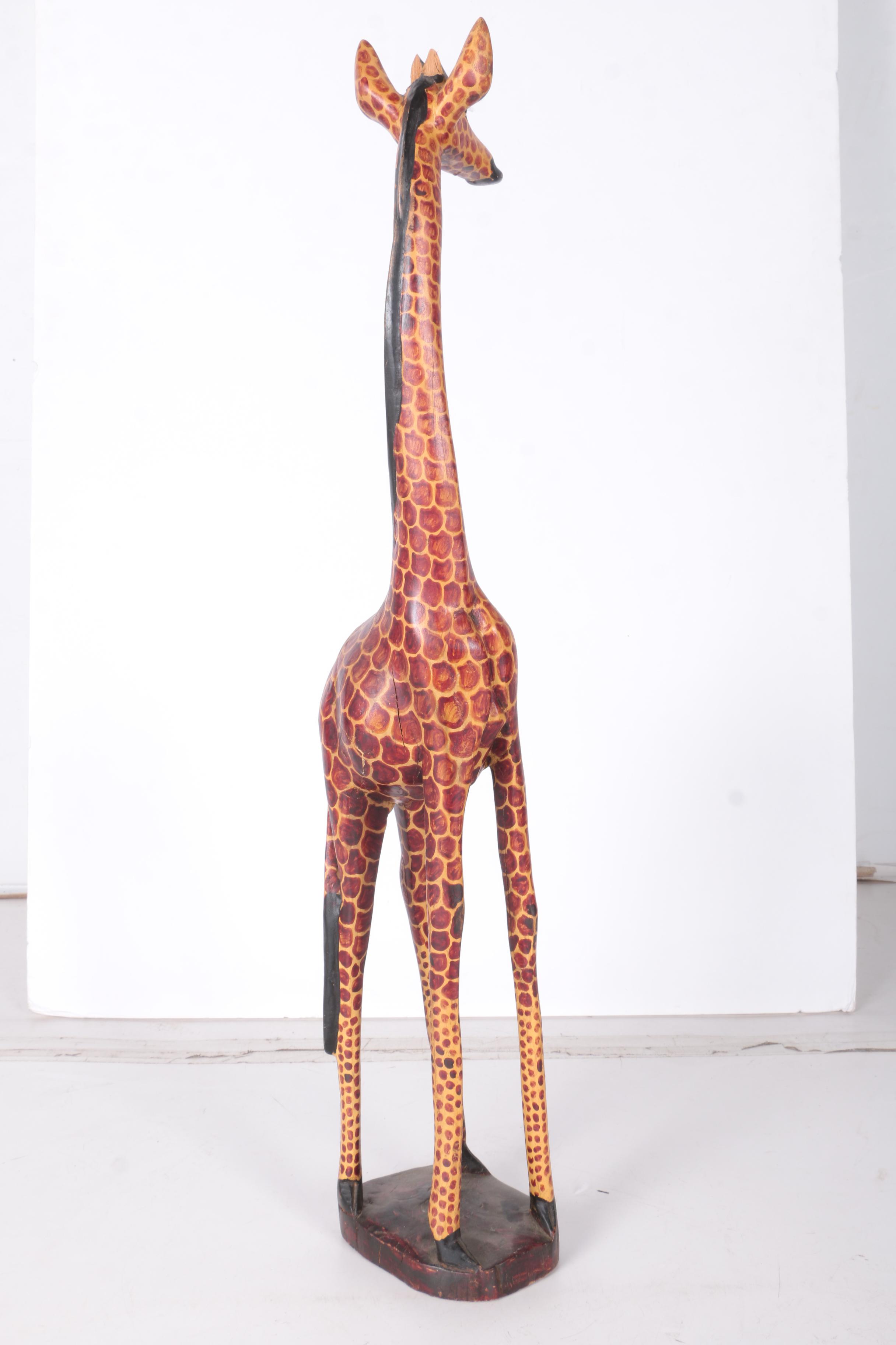 Carved Wood Giraffe Statue EBTH   1515438423752 Dd5d8b1e7d88f8acce8e9486c6a3d1a64a38a0221cb296fac158b18eadd06de9.JPG