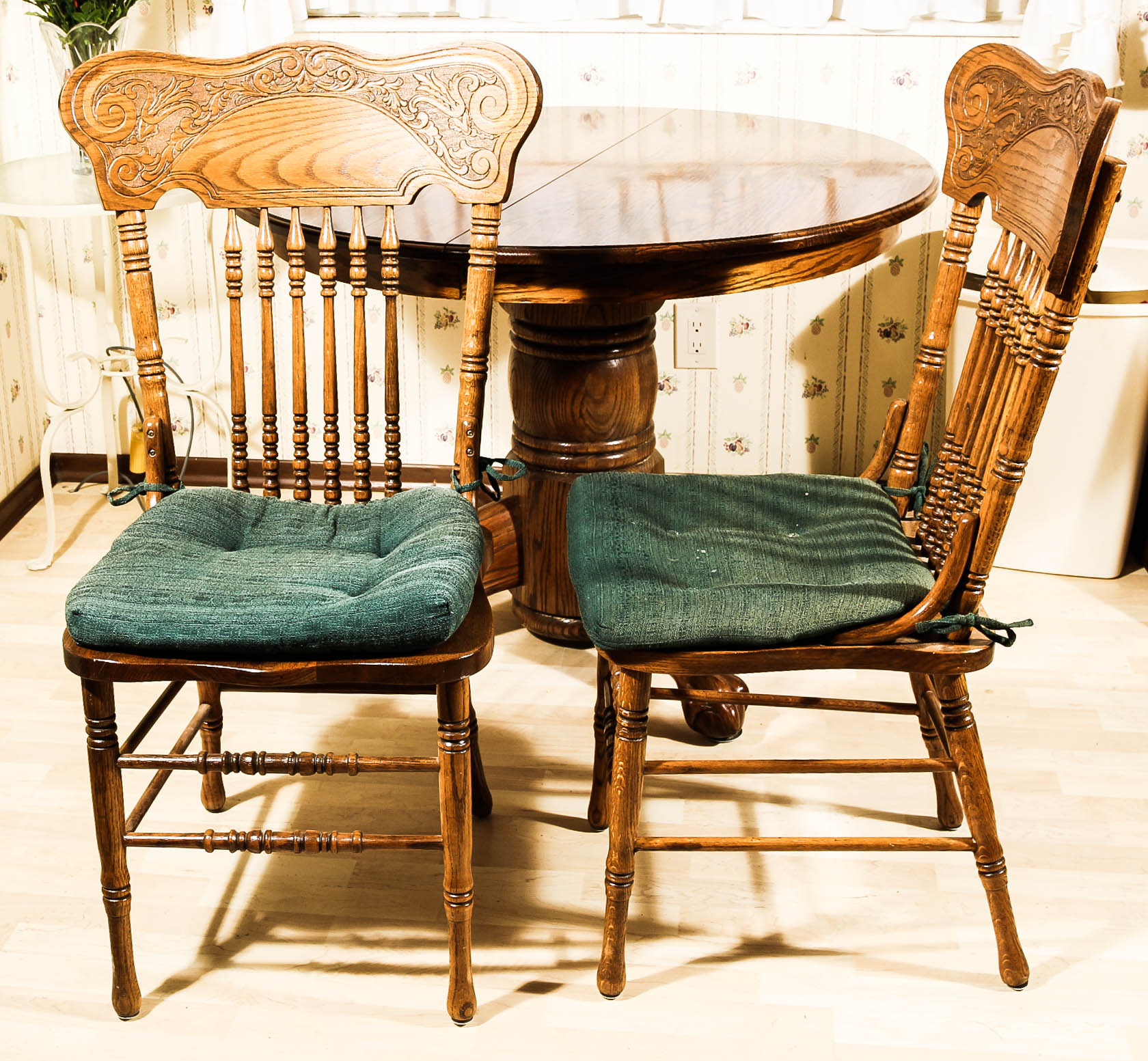 A Claw Foot Oak Dining Table and Chairs EBTH