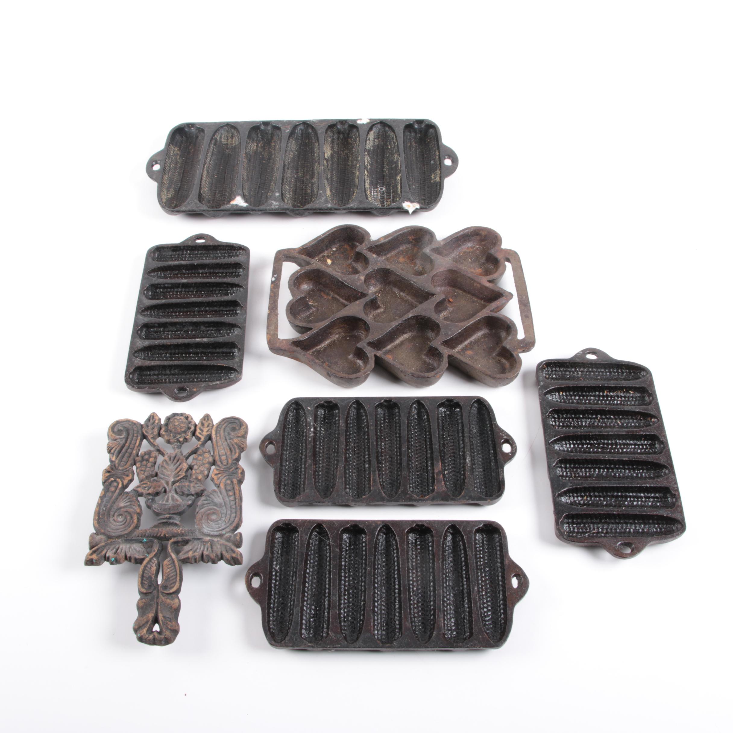 Vintage Cast Iron Molds and Trivet EBTH