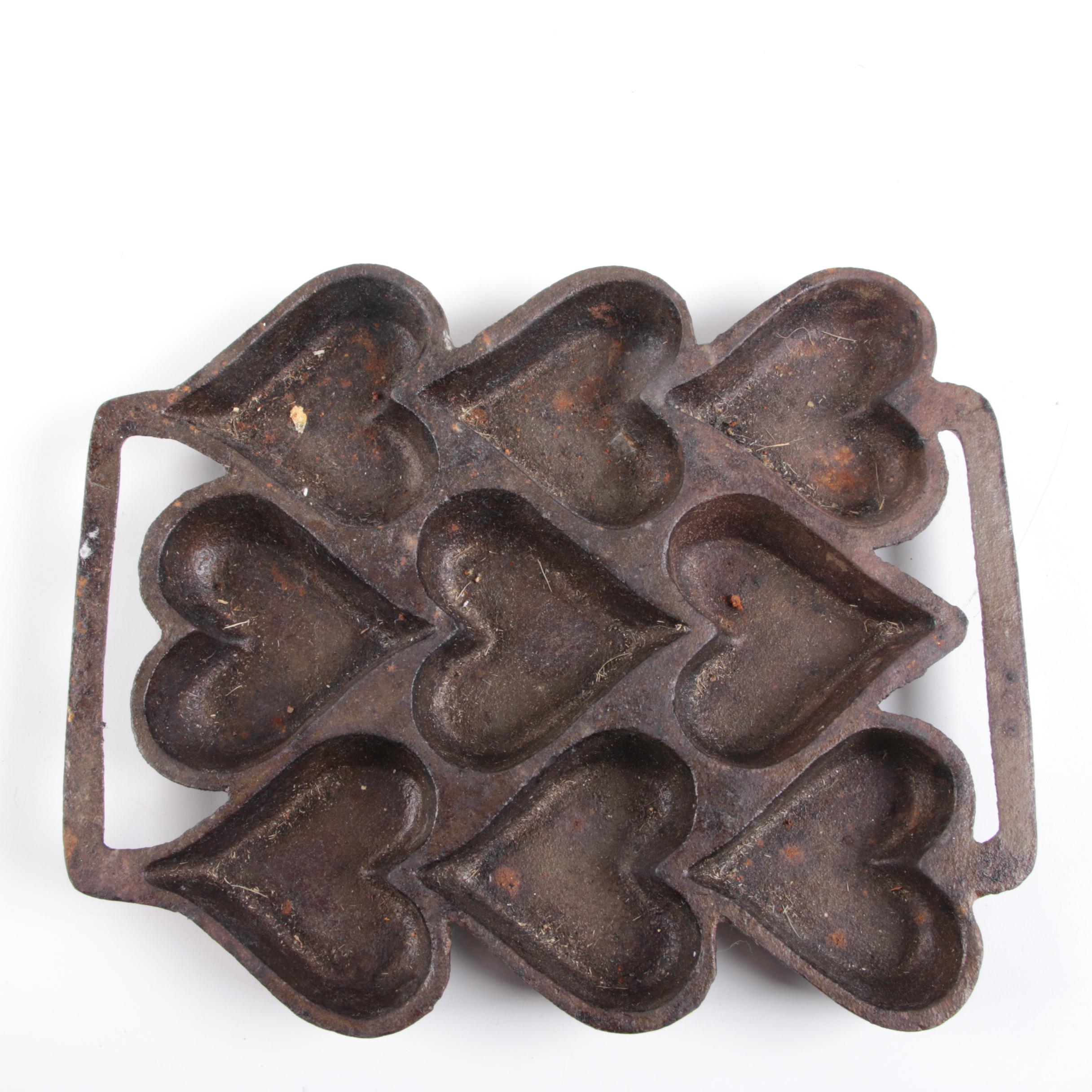Vintage Cast Iron Molds and Trivet EBTH