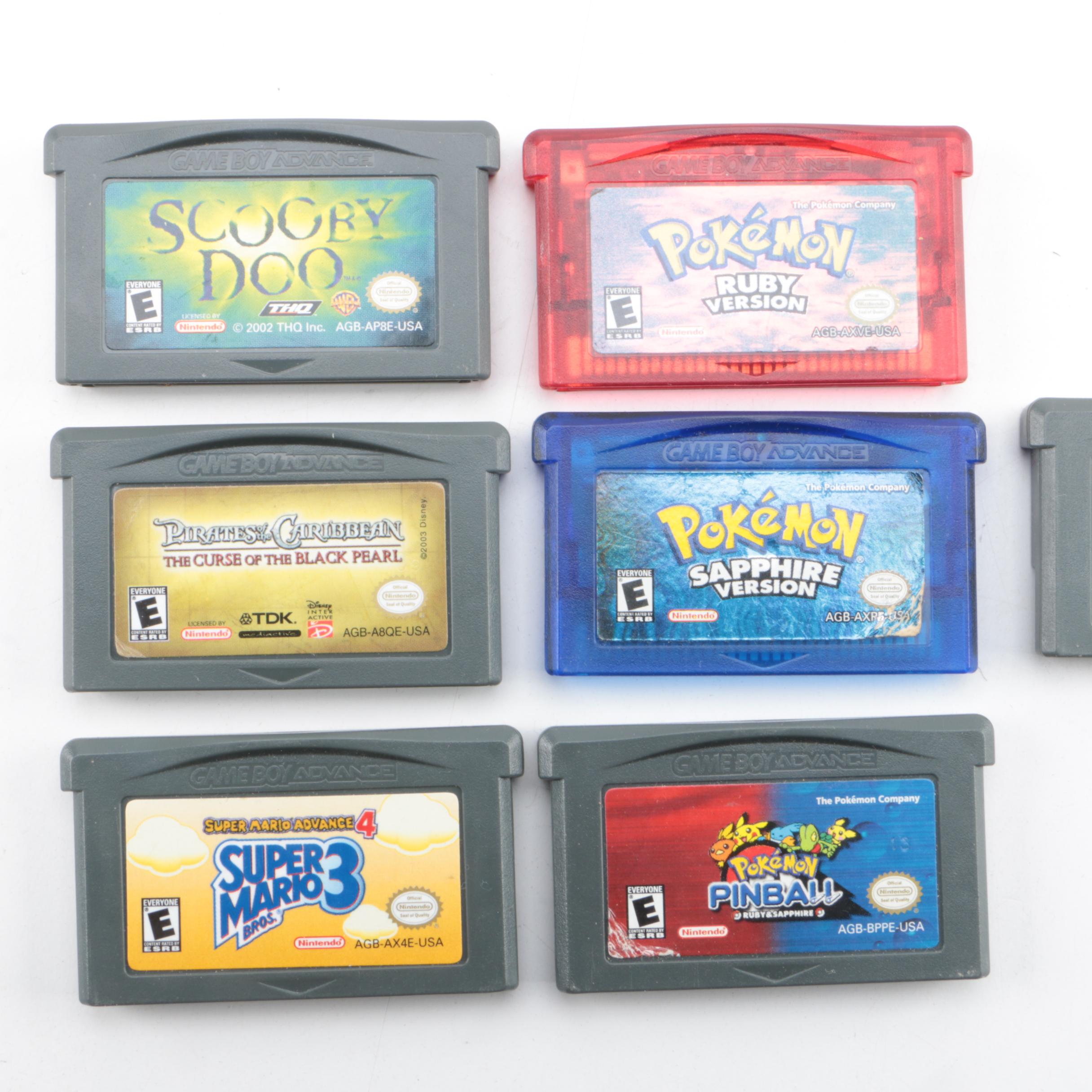 Game Boy Advance SP, Games And Case Featuring Pokémon Ruby And Sapphire ...