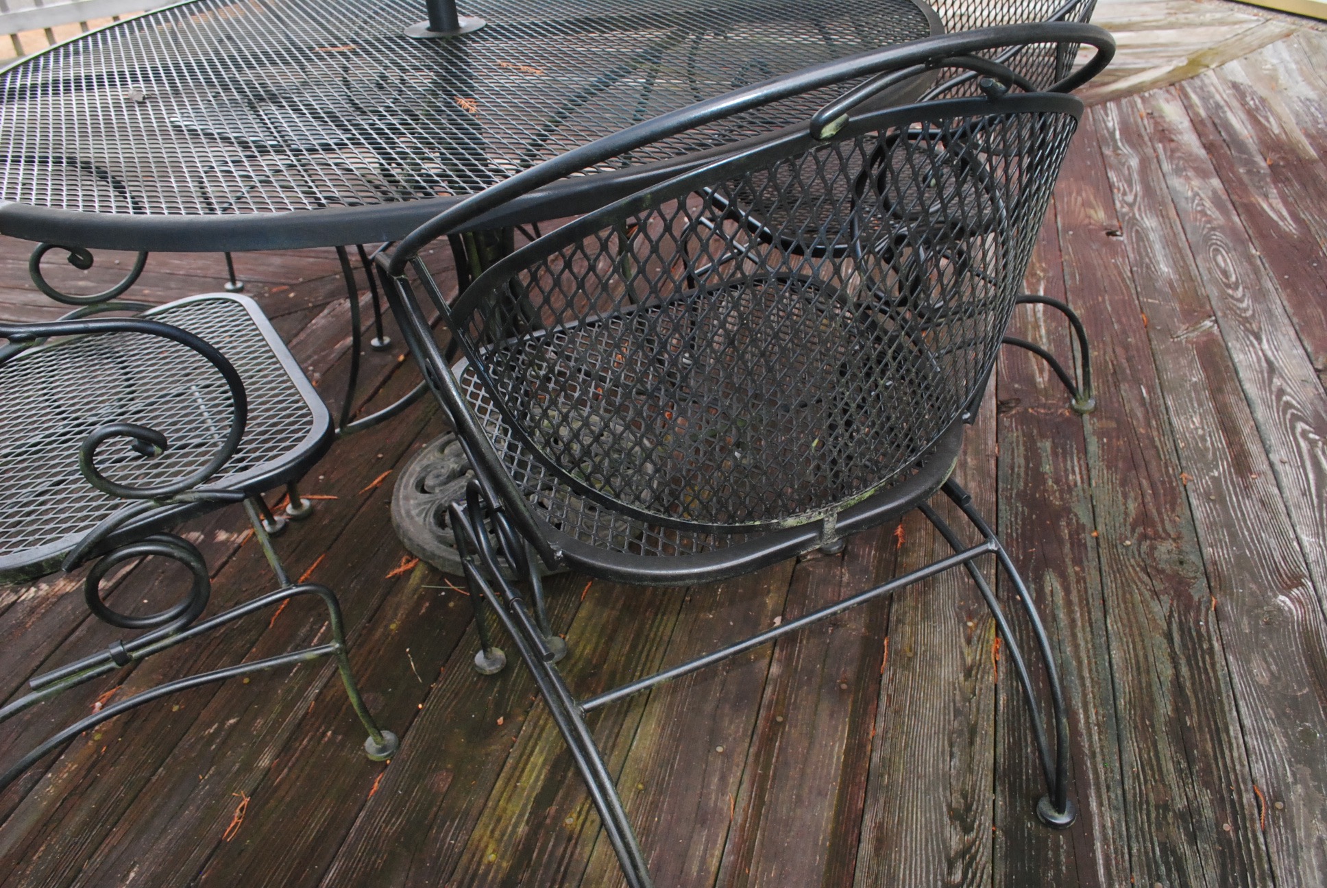 Black Metal Patio Table and Barrel Back Chairs EBTH