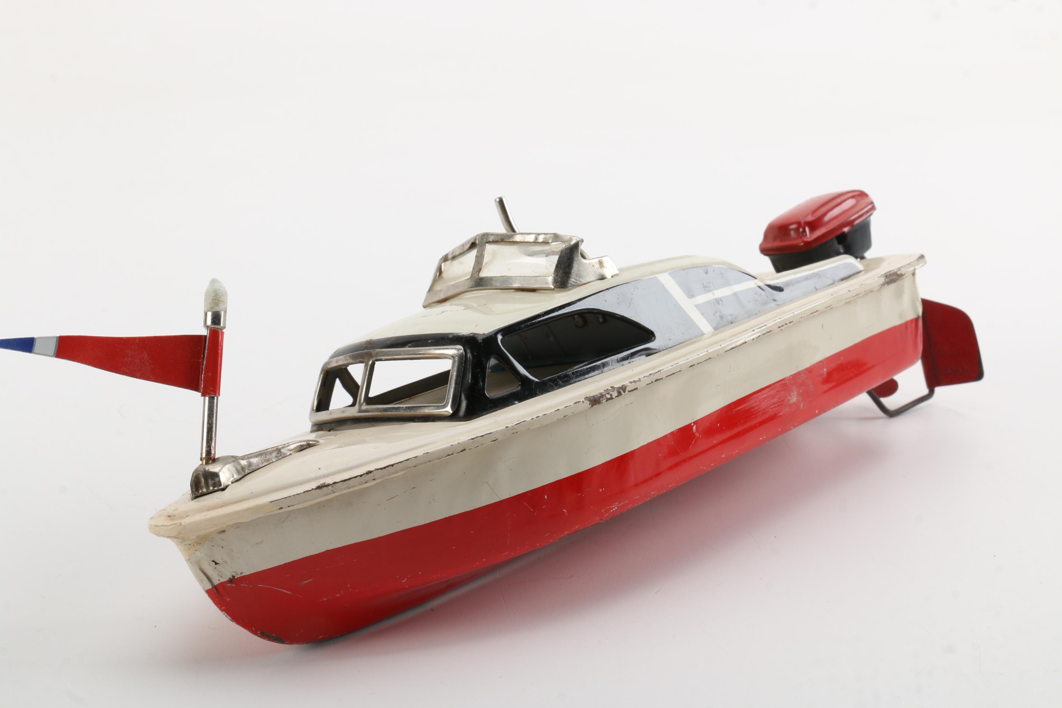 Vintage WindUp Speed Boat Toy With Stand EBTH