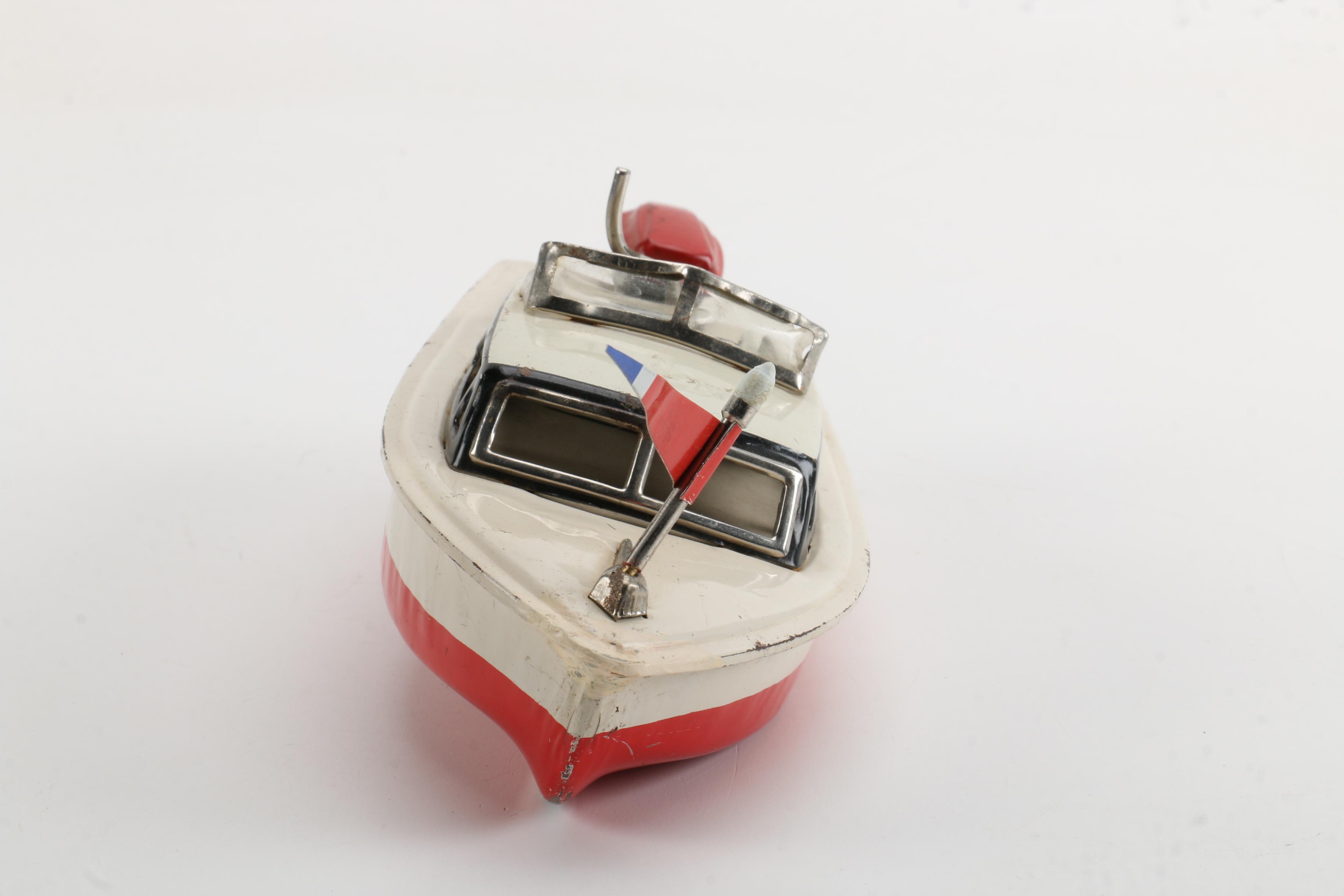 Vintage WindUp Speed Boat Toy With Stand EBTH