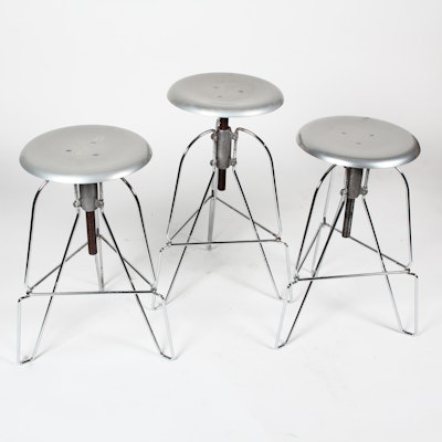 Three Jeff Covey Model 6 Spun Aluminum Three-Legged Bar Stools Three Jeff Covey Model 6 Spun Aluminum Three-Legged Bar Stools
