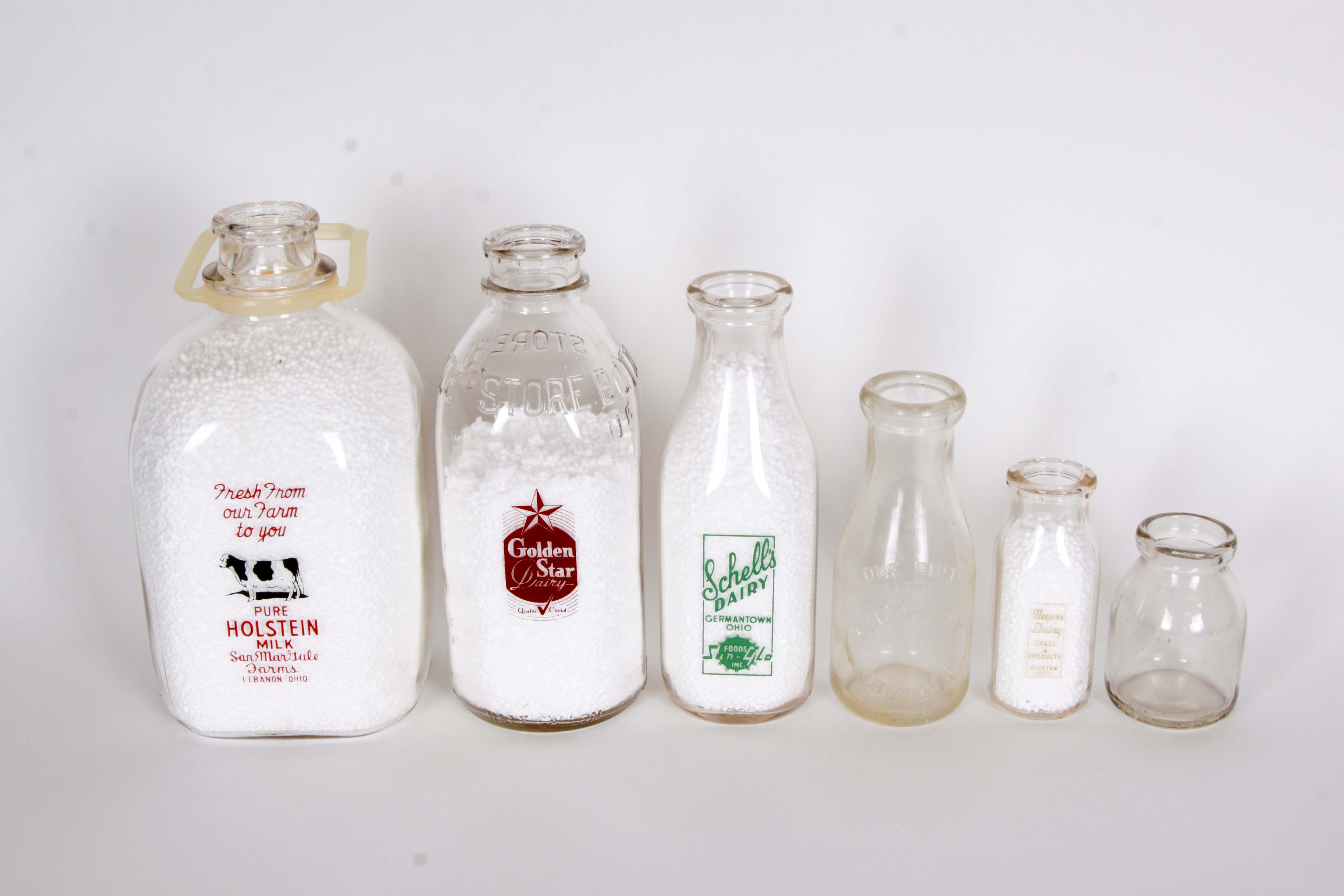 Collection of Vintage Ohio Milk Bottles I EBTH