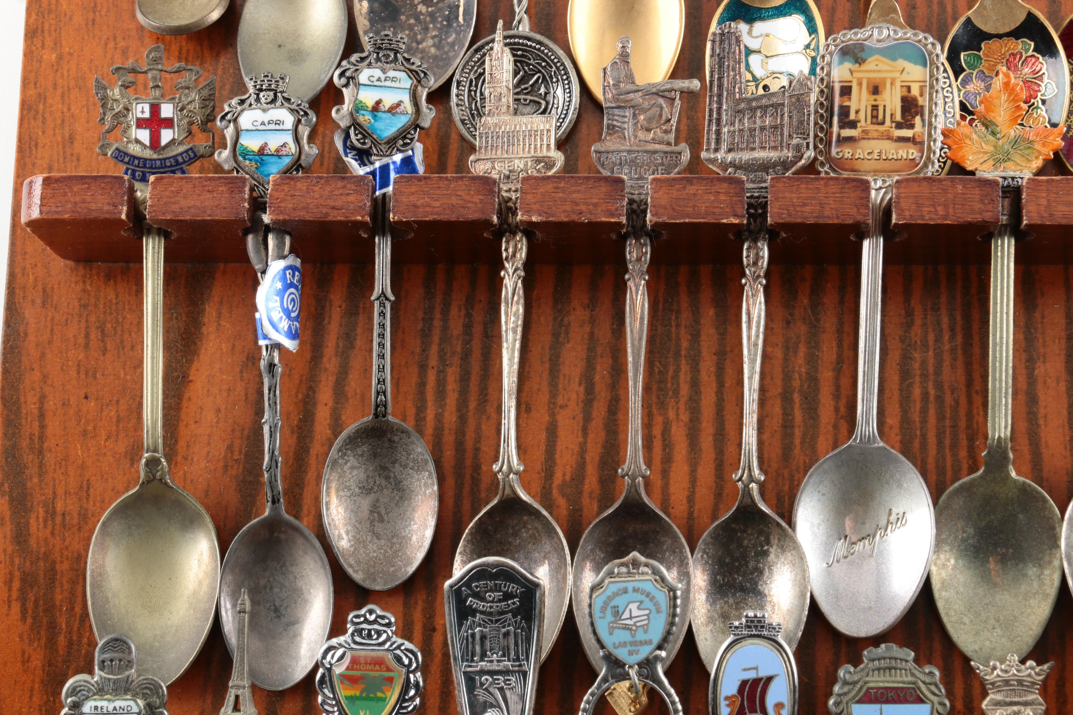 Souvenir Spoon Collection on Wooden Display Including Sterling and 900