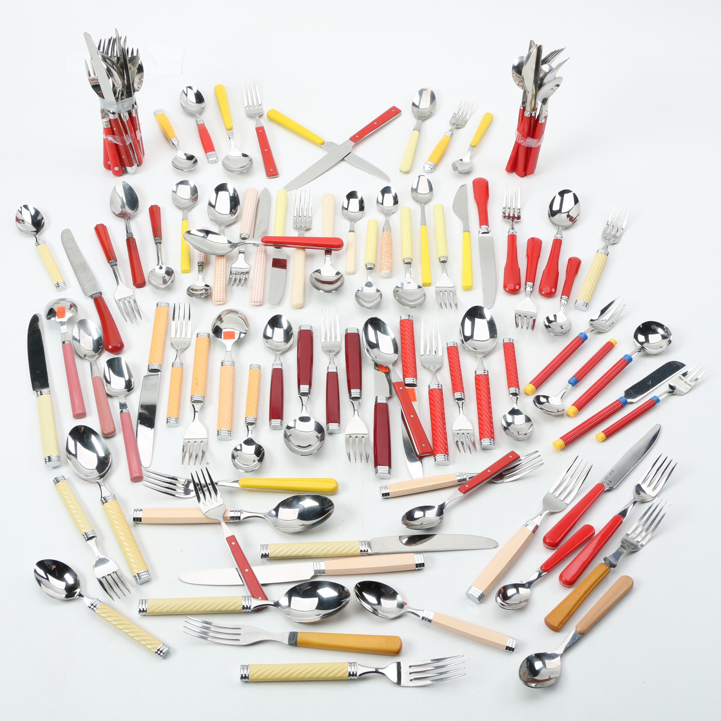 Collection of Stainless Flatware with Plastic Handles. EBTH