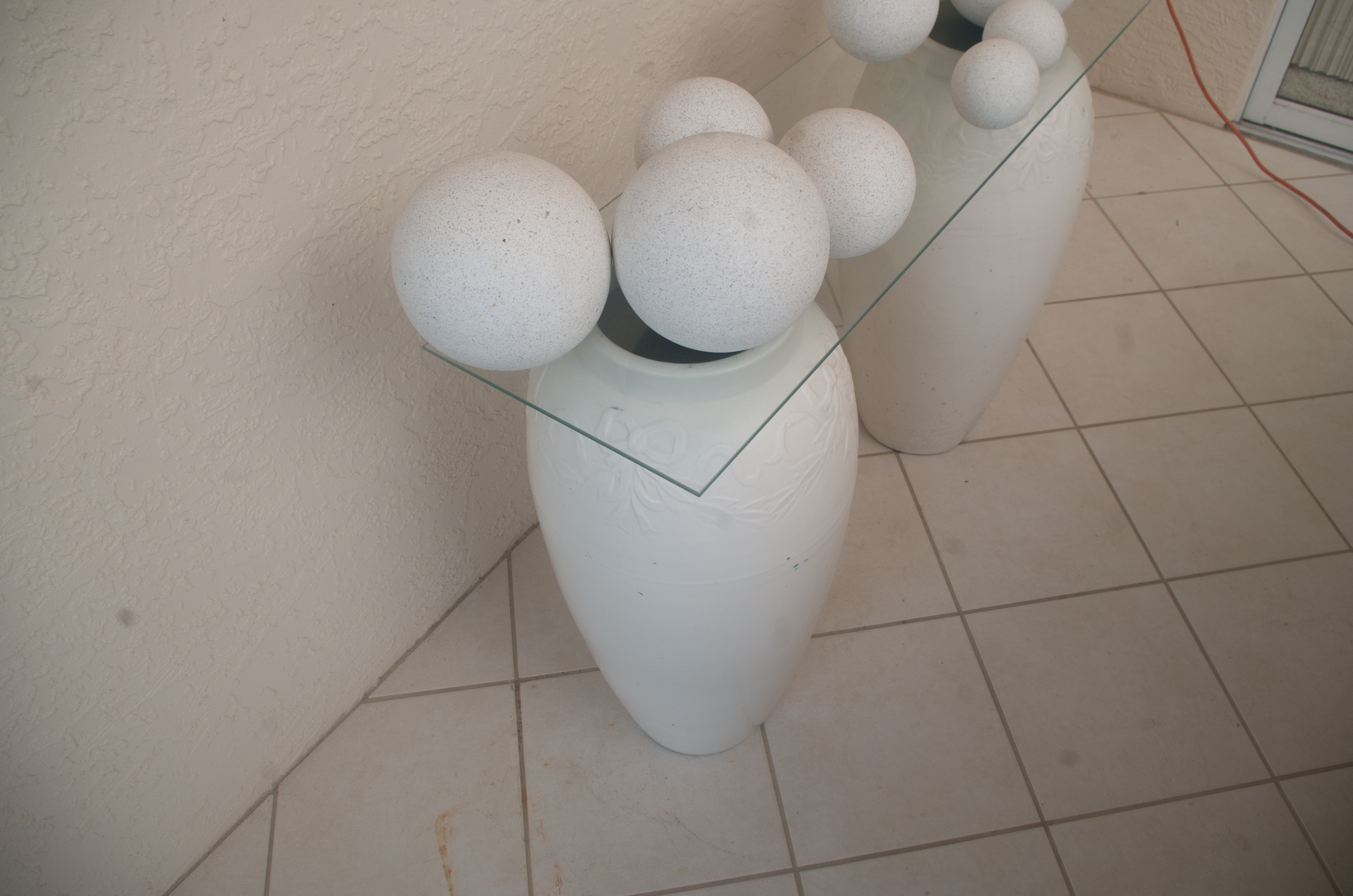 Amphora Console Table with Cast Orb Collection | EBTH