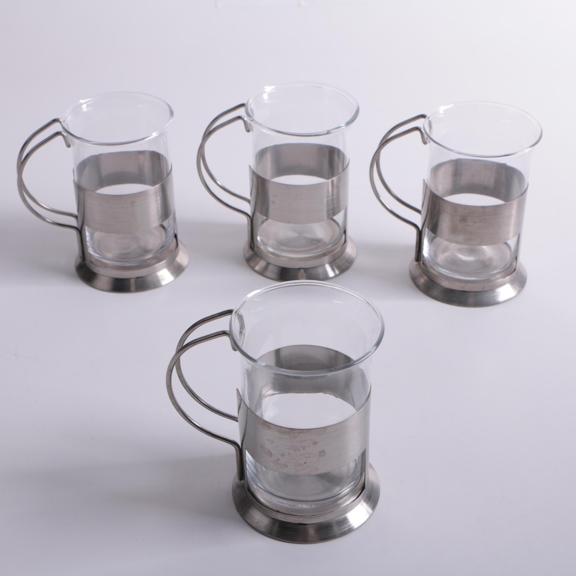 glass and metal mugs