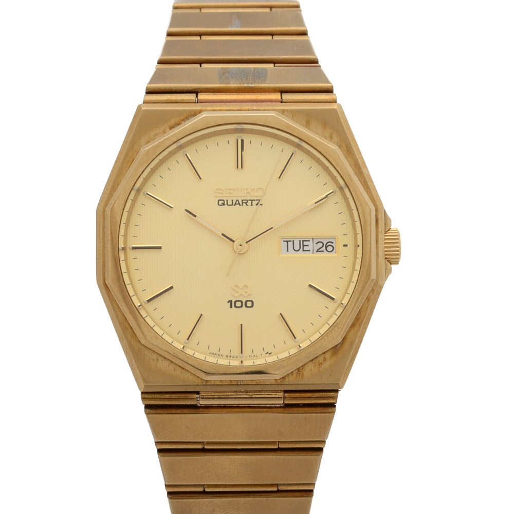 seiko sq100 gold