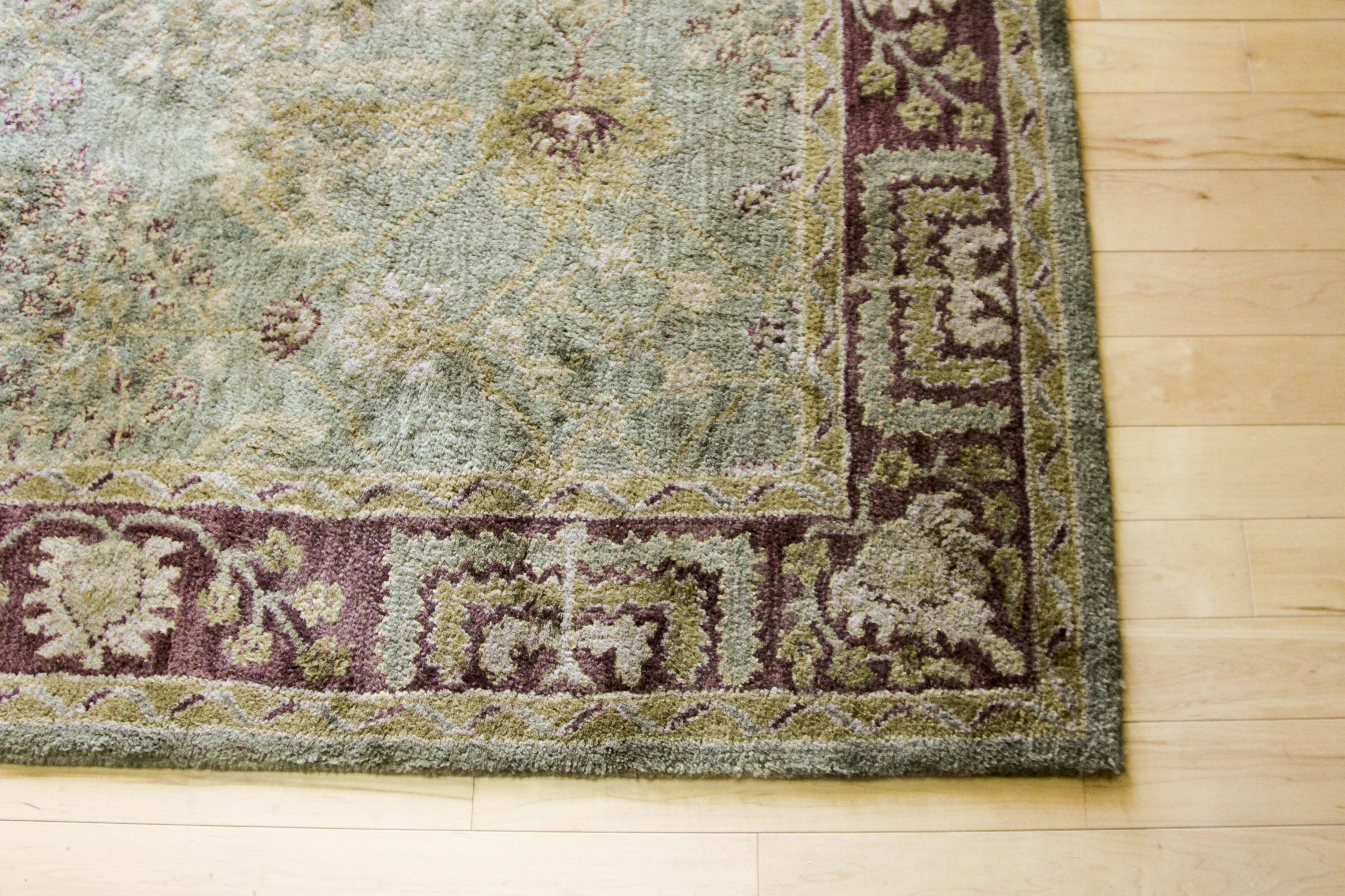 A Hand Tufted Pottery Barn Area Rug EBTH