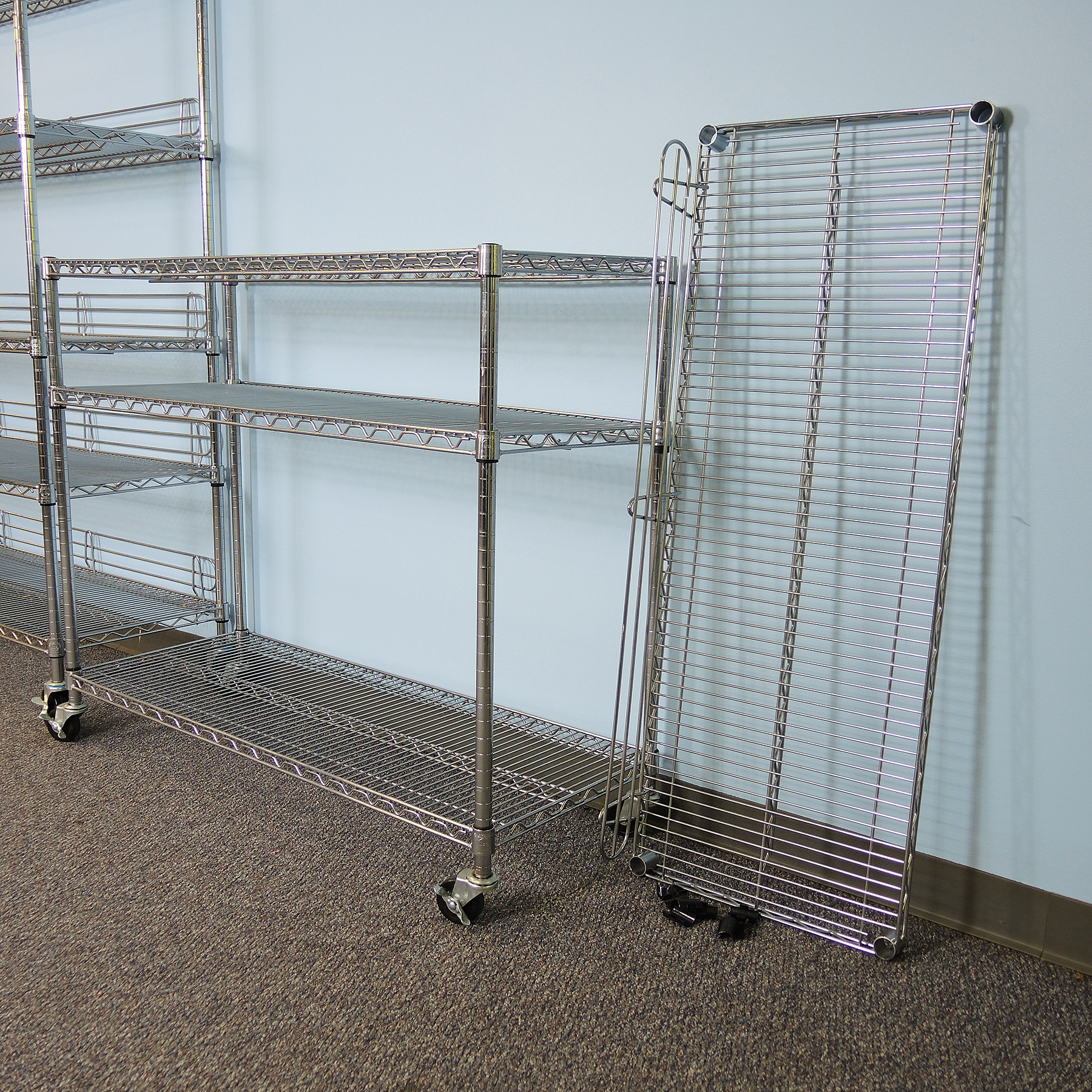 Two Heavy Duty Wire Shelves on Wheels EBTH