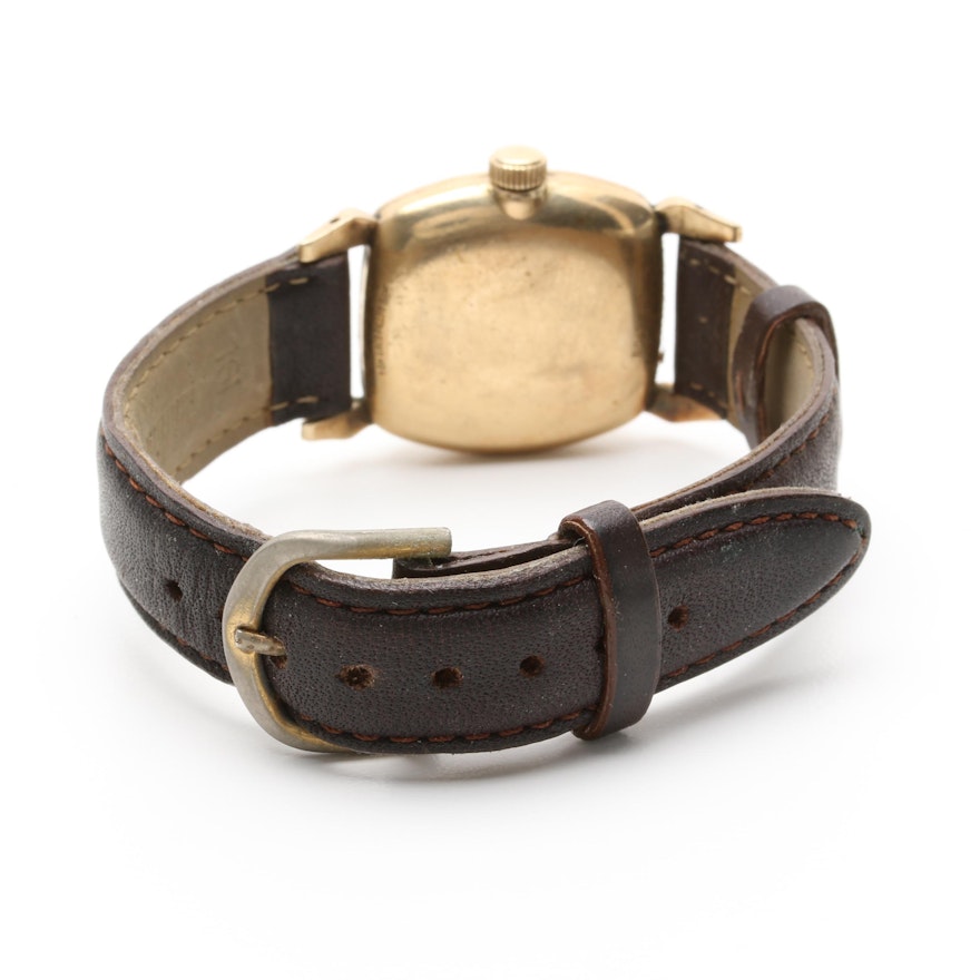 gold watch brown strap