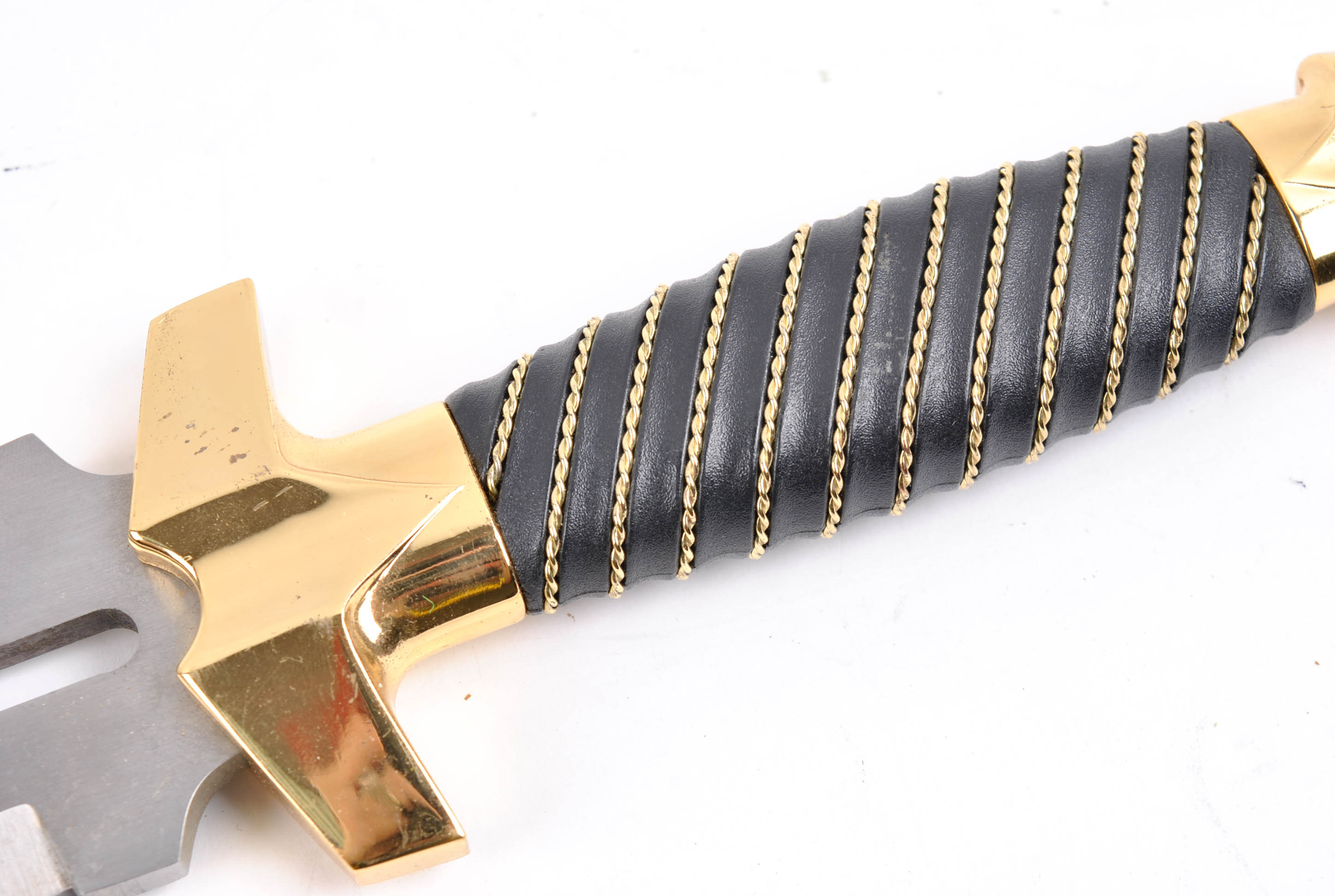 Hibben Knives DualTip Fantasy Knife by Sid Hill with Wooden Wall