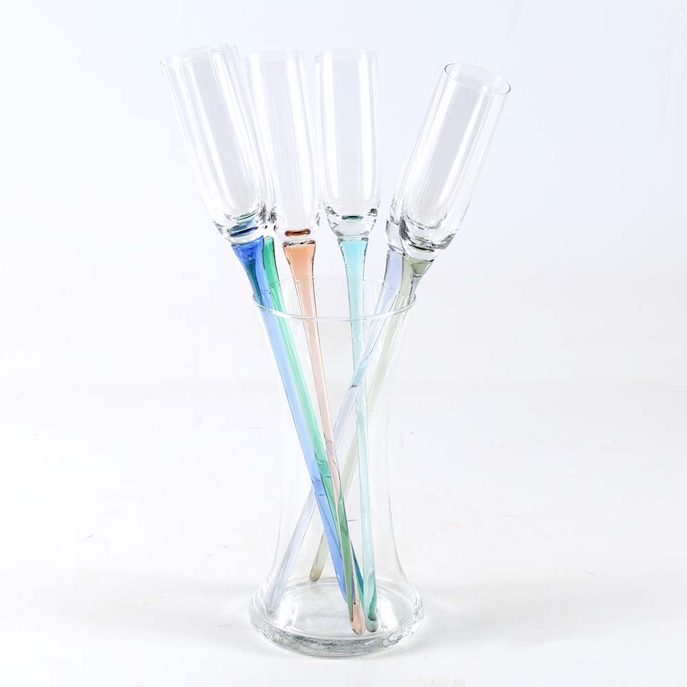 Long Stemmed Champagne Flutes In Vase Ebth