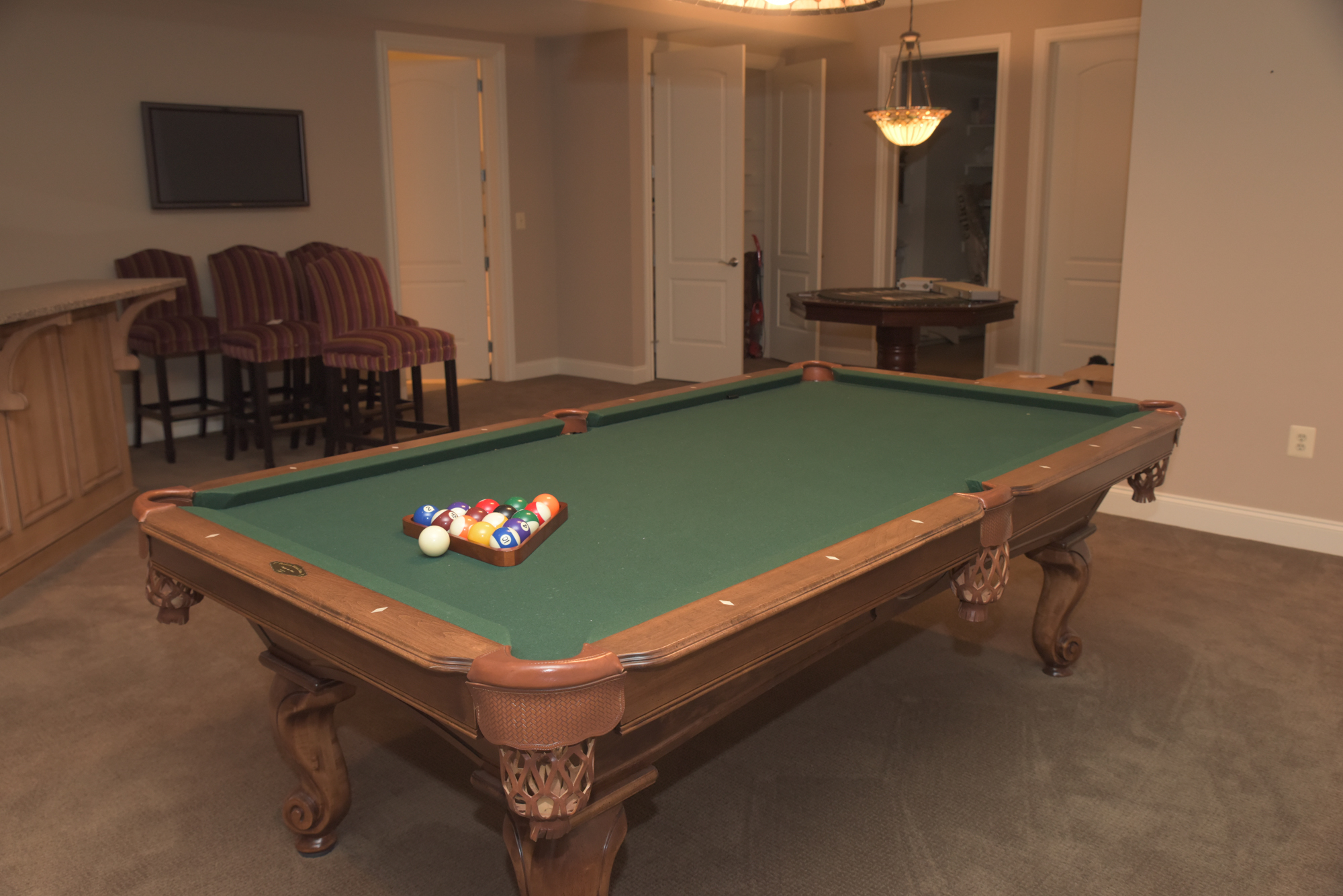 ProLine Billiards Table with Cues, Wall Rack, and Accessories EBTH