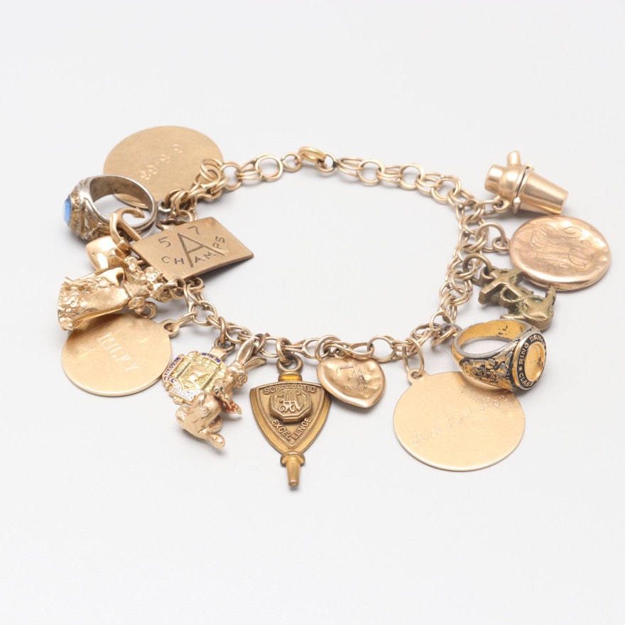 14K Yellow Gold Charm Bracelet with 14K, 10K Yellow Gold and Gold Tone Charms
