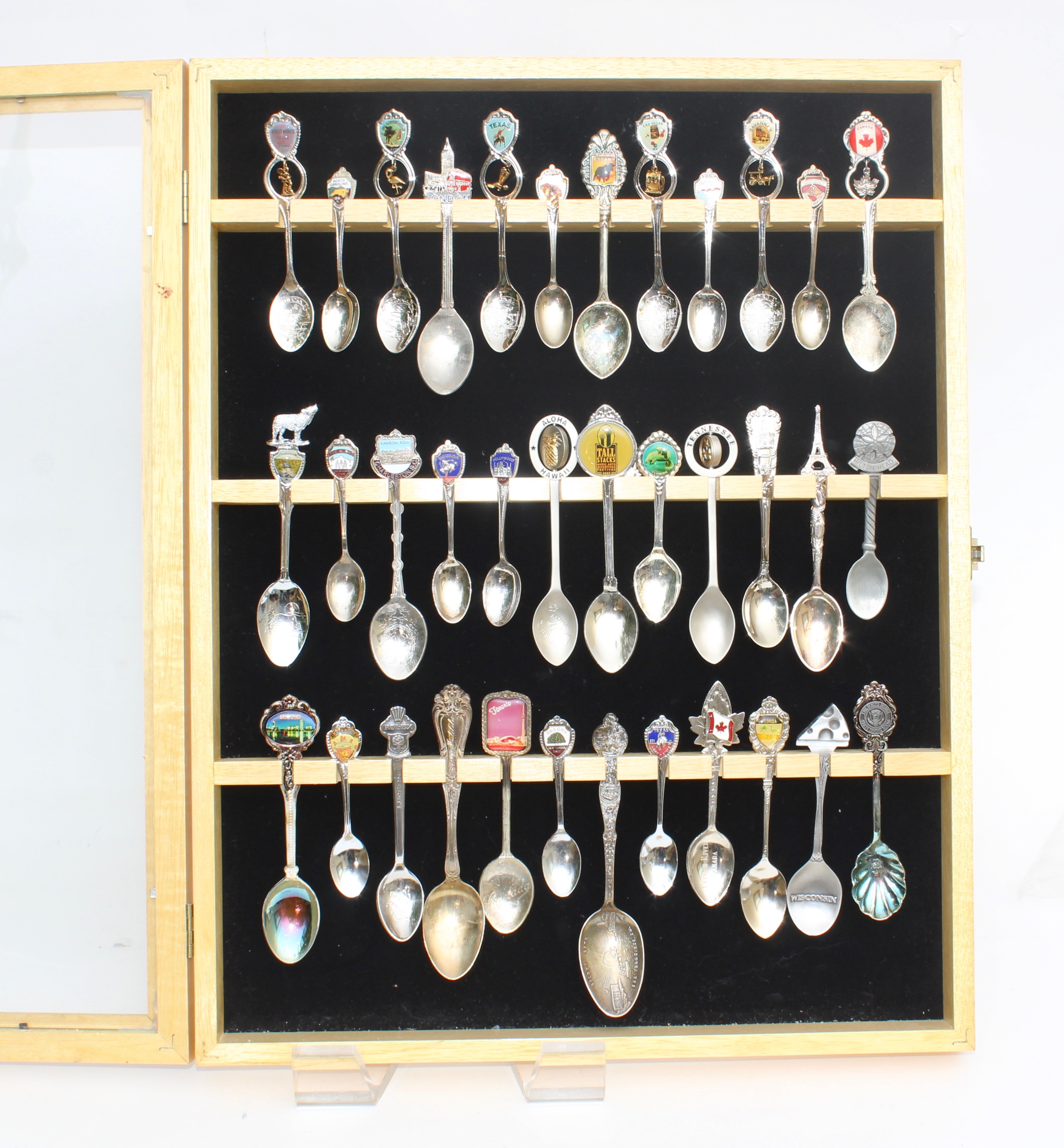 Collection of Vintage Souvenir Spoons in Glass Display Case EBTH