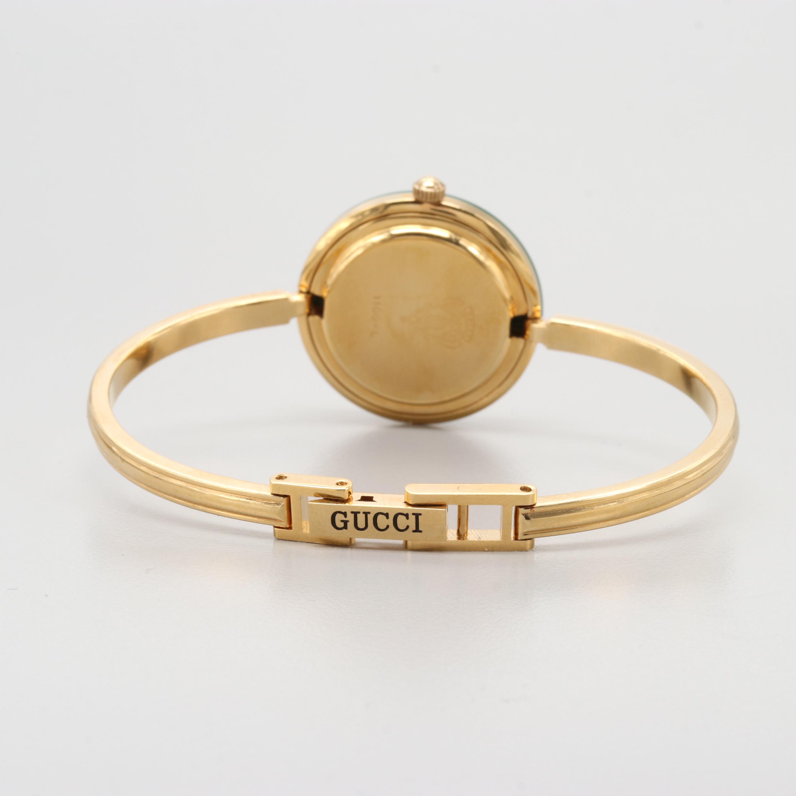 Gucci 1100L Gold Tone Quartz Wristwatch With Interchangeable Bezels EBTH