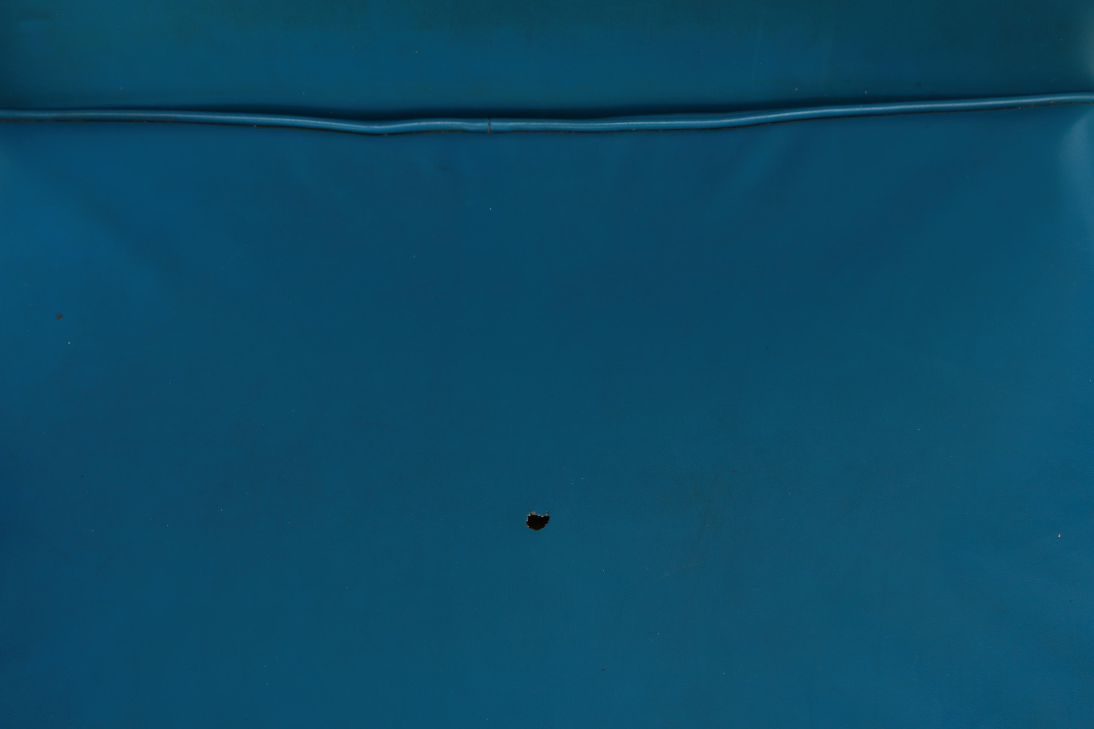 Jack Cartwright Inc., Three Aluminum and Blue Vinyl Lounge Chairs