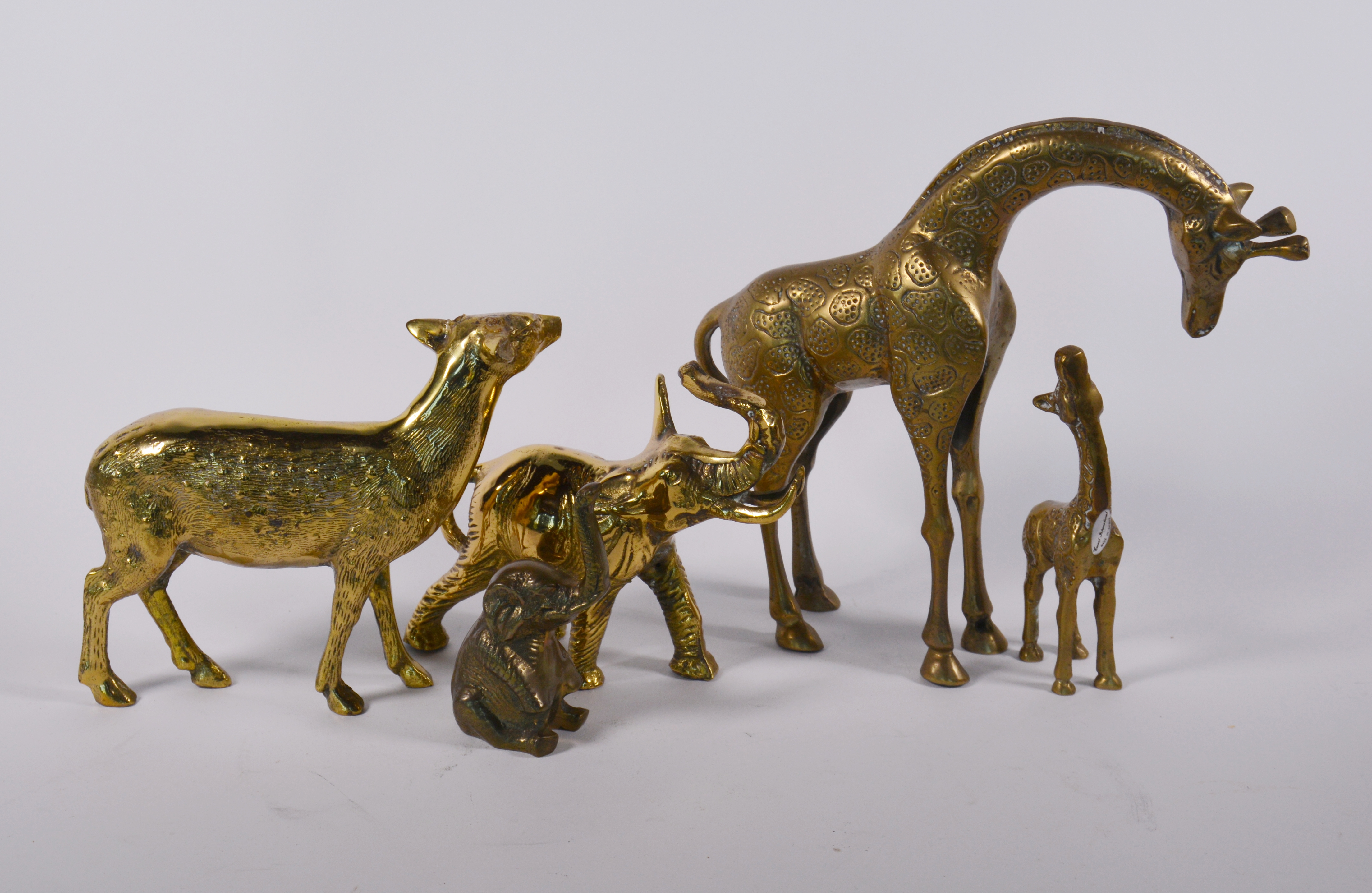 Brass Animal Figurines Including Giraffes and Elephants EBTH