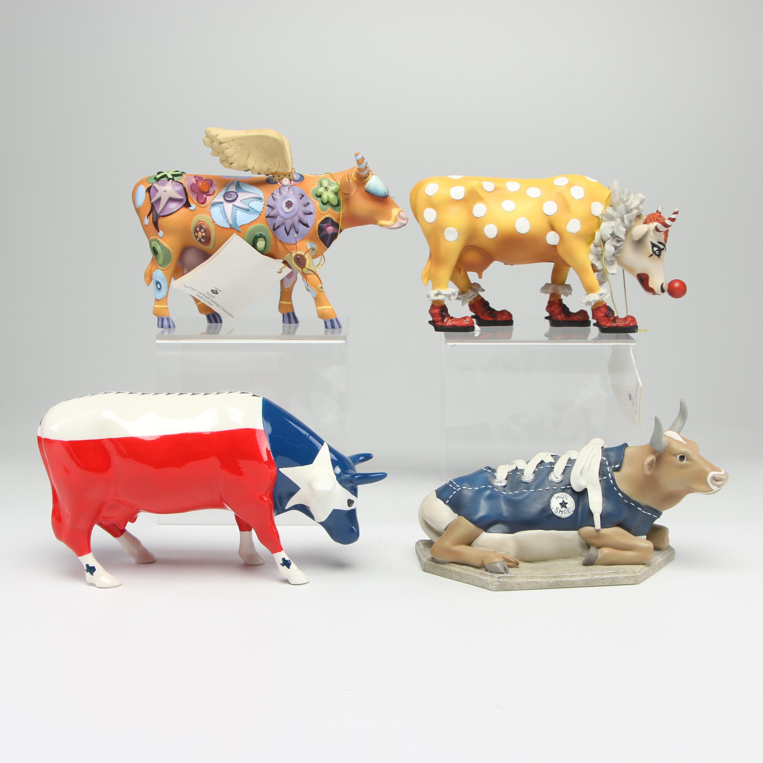Cow Parade Figurines and Bookends Including "MooShoe" and "AngeliCow