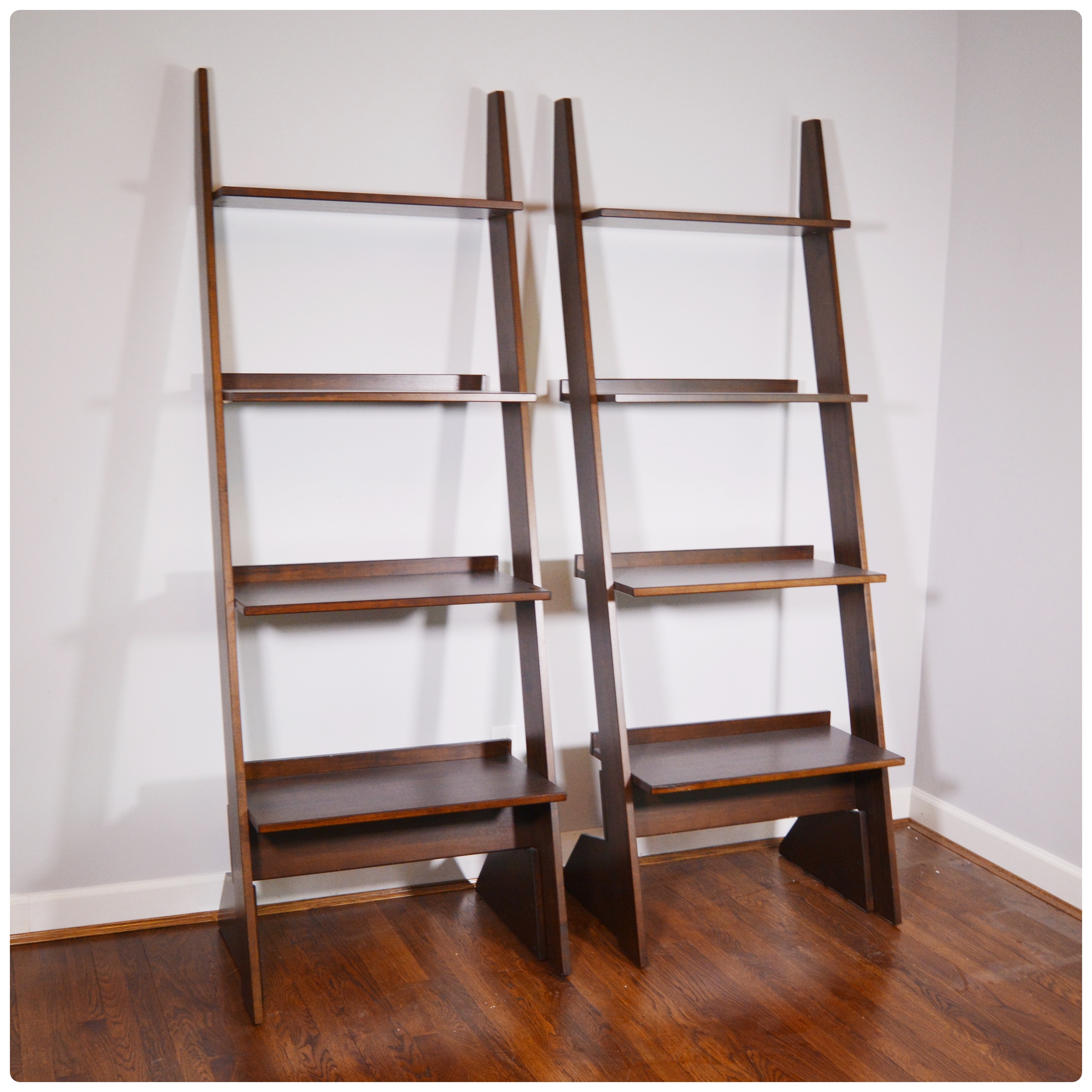 Pair of Walnut Finish Wooden Leaning Bookcases, Contemporary EBTH