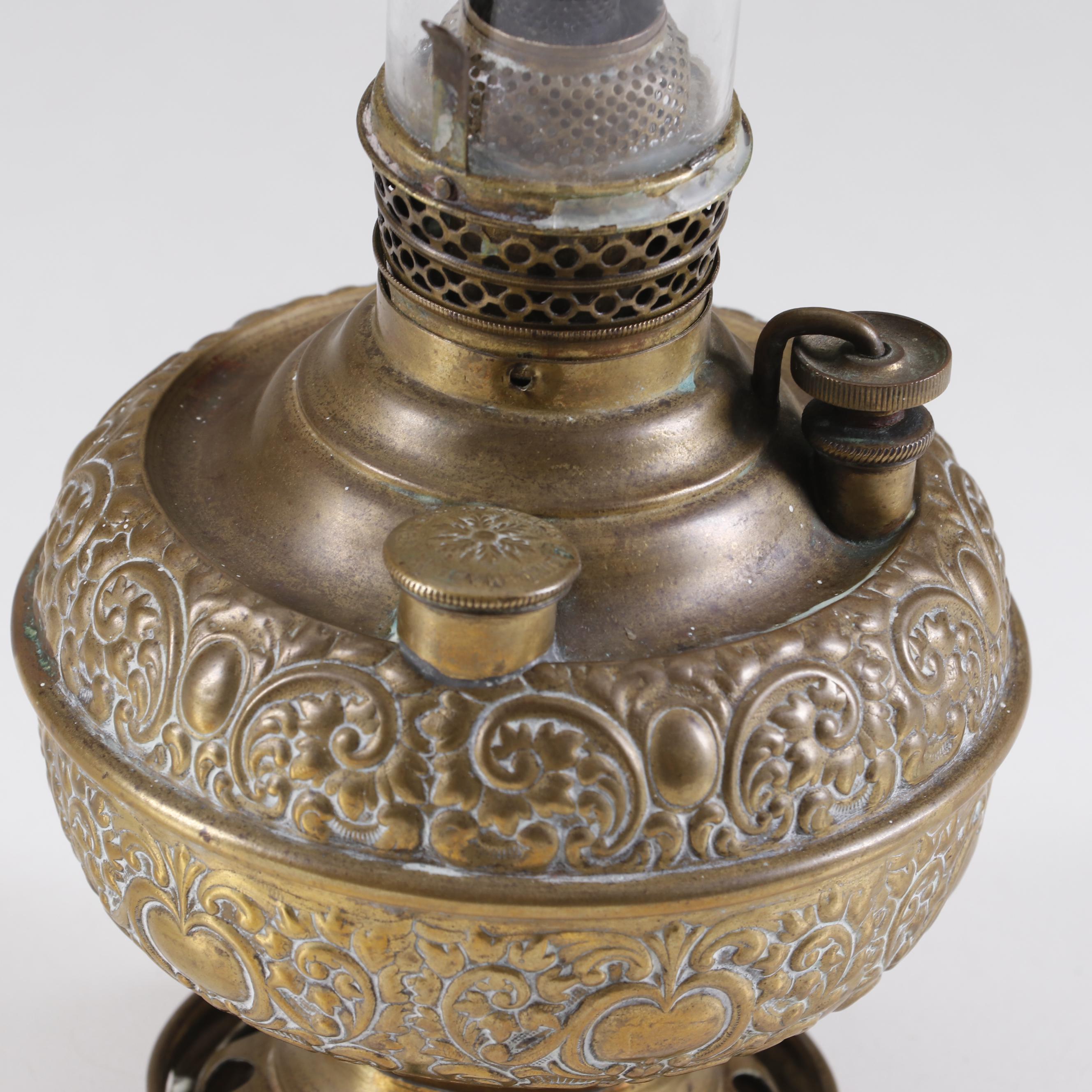 Miller Repoussé Brass Oil Lamp with Glass Hurricane, Late 19th Century