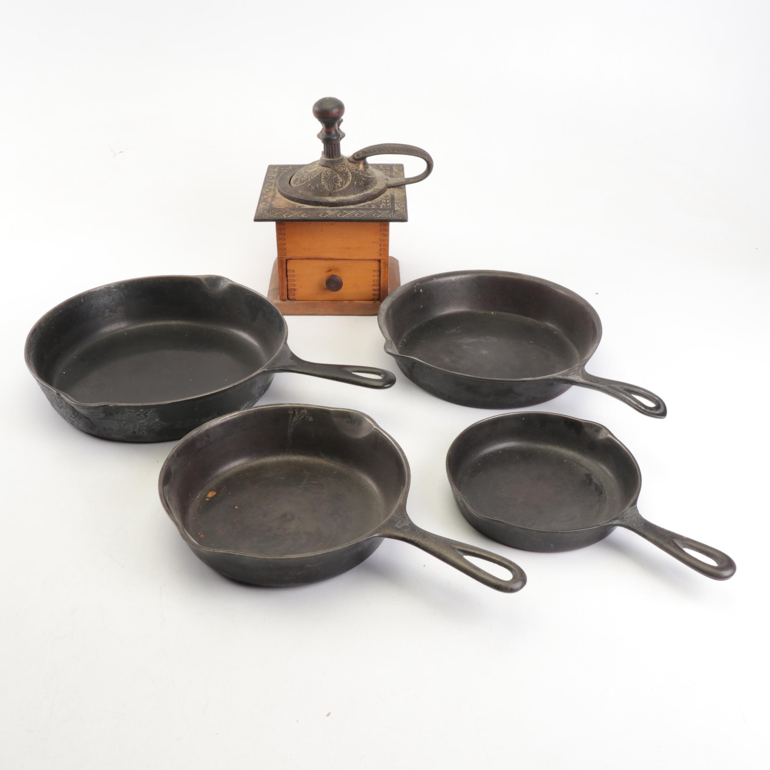 Coffee Grinder with Cast Iron Skillets Including Wagner Ware, Circa 1920 EBTH